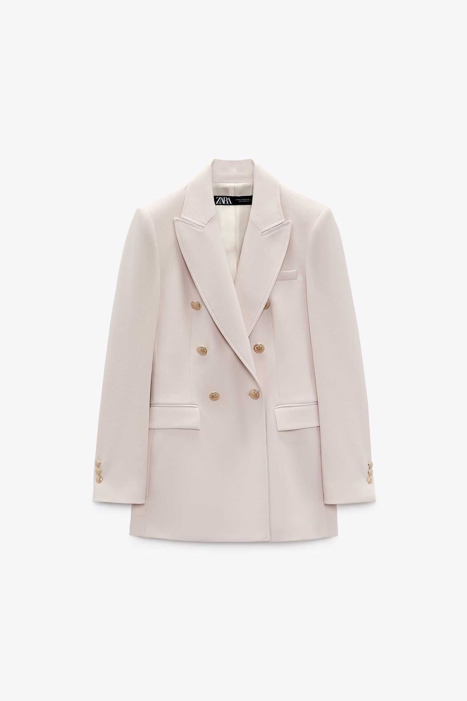 Blazer en crudo de Zara.