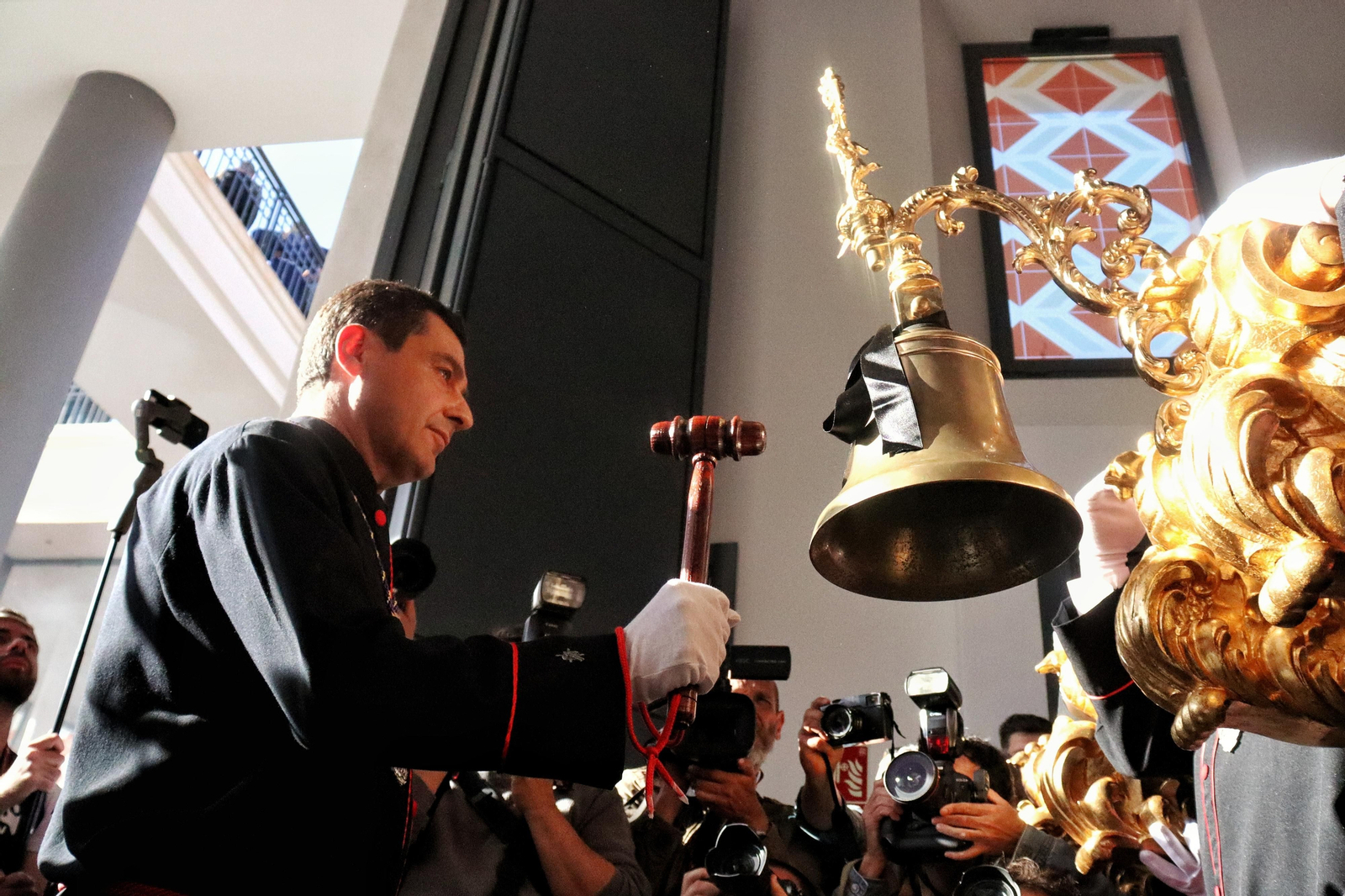Fusionadas en su procesión del Miércoles Santo en Málaga, en fotos