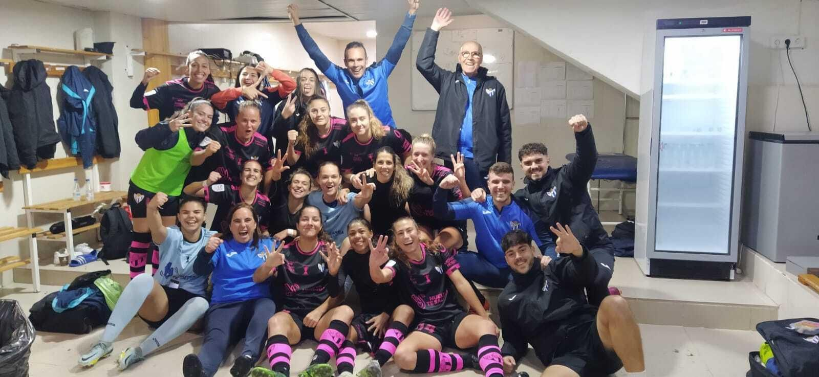 Foto de familia de la celebración del triunfo.