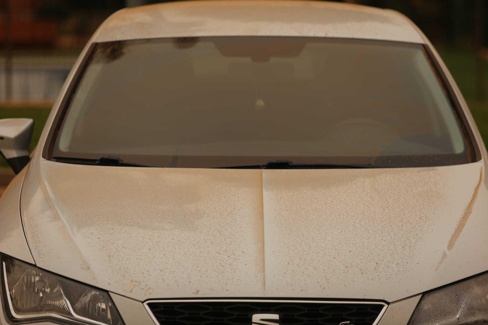 Fotos del efecto de la calima en Málaga y en sus coches