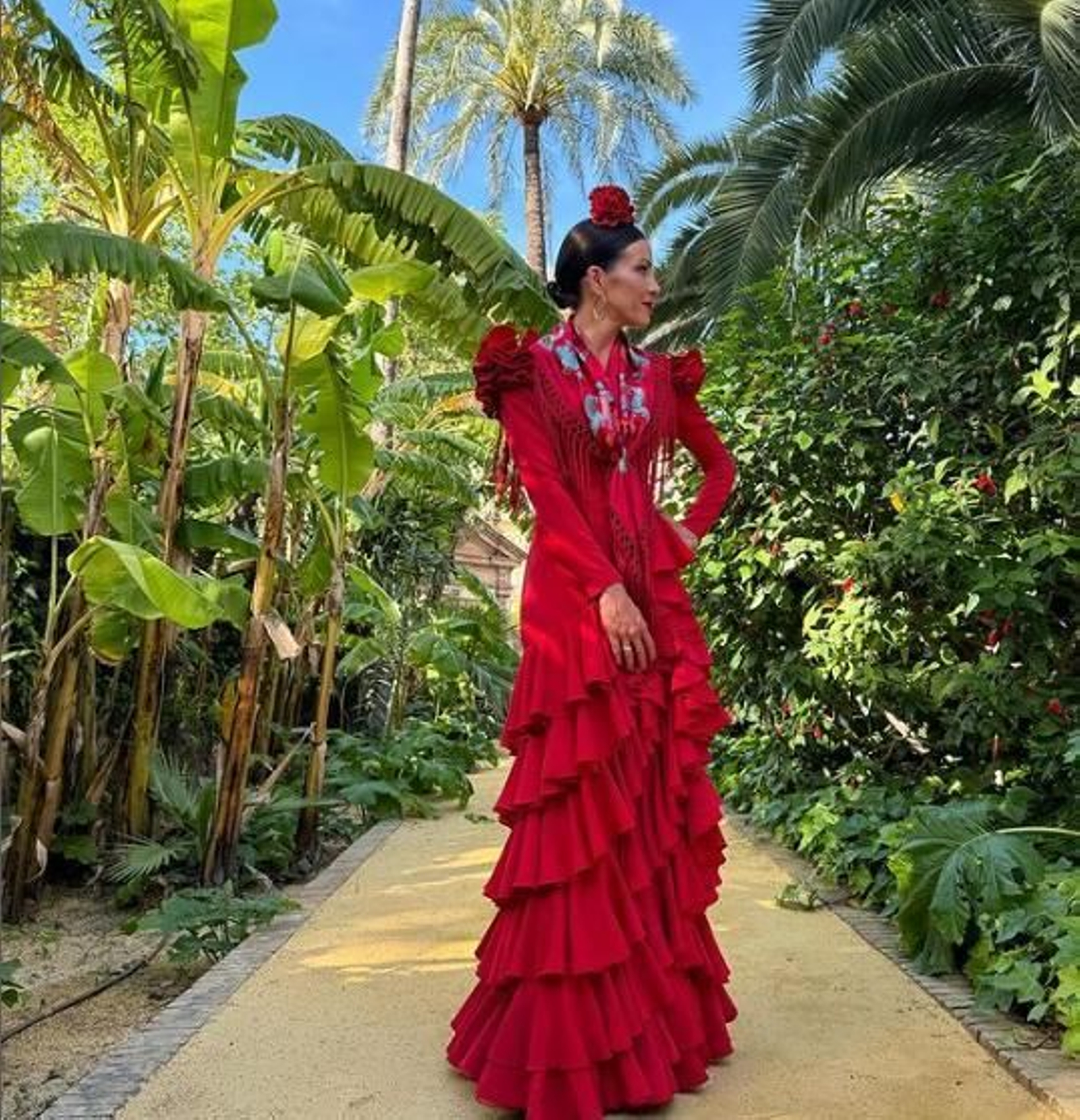 Virginia Troconis con traje de flamenca en la Feria de Abril.