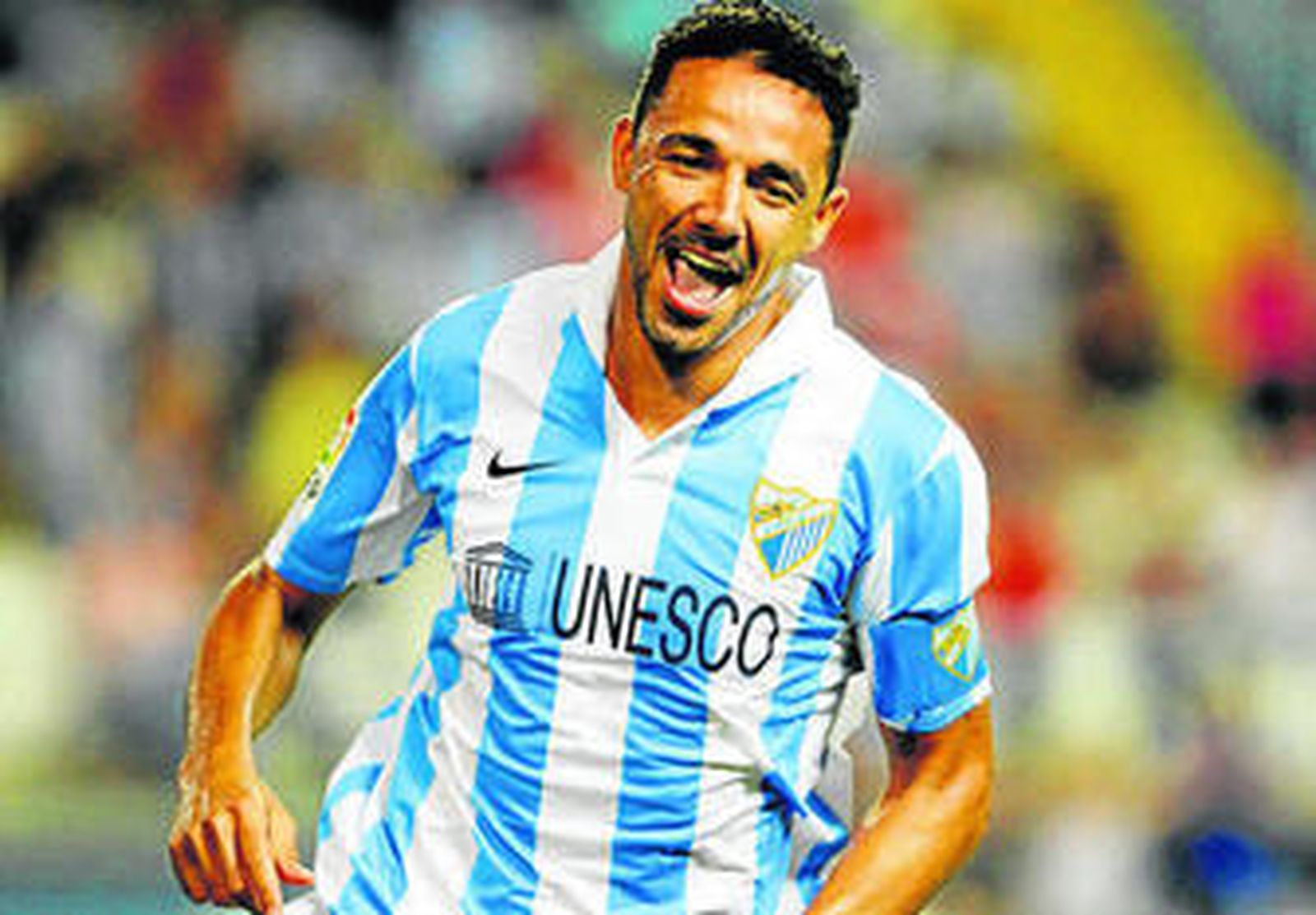 Weligton celebra con un gol con el Málaga.