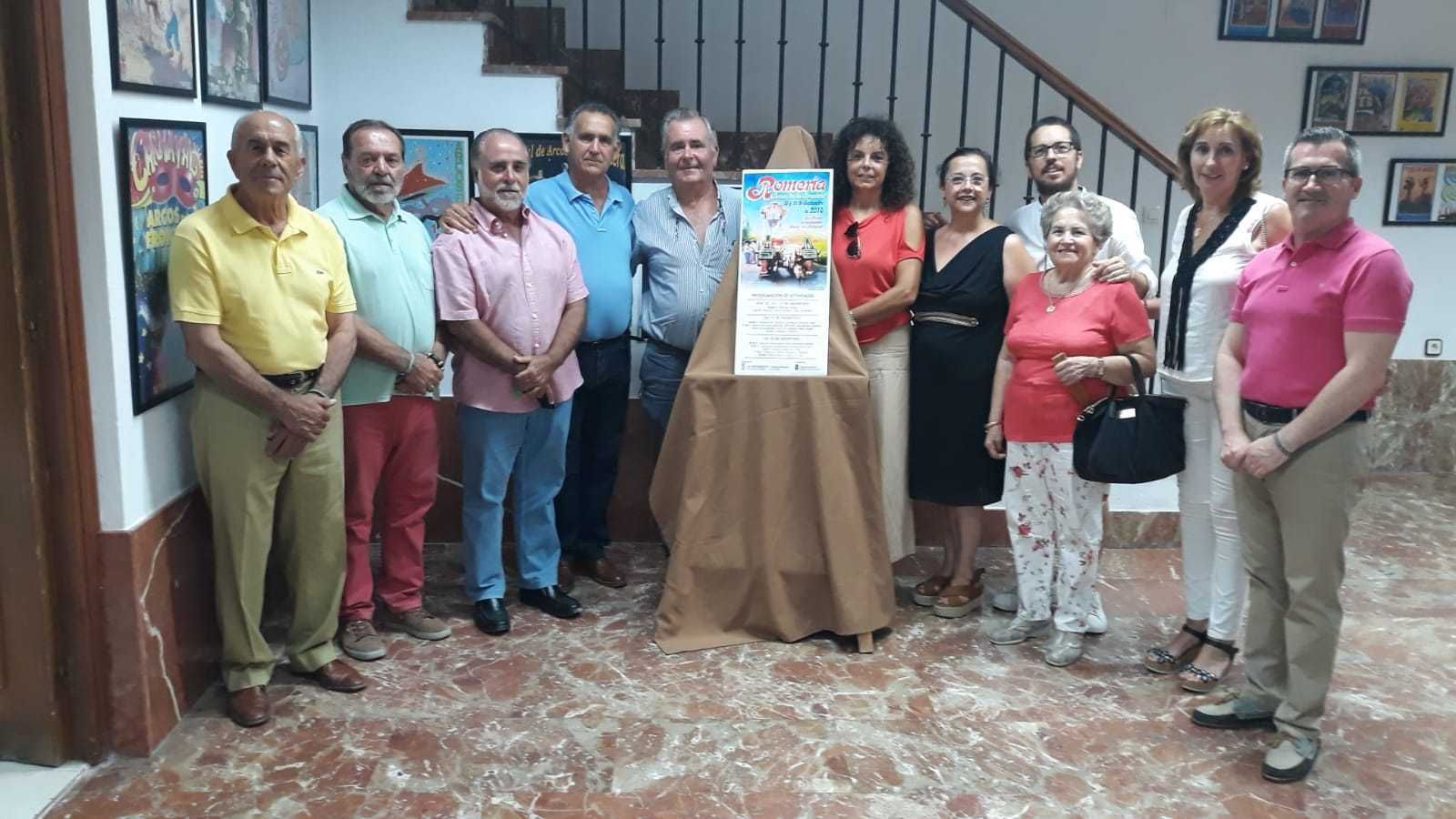 Un momento de la presentación del cartel de la romería arcense.