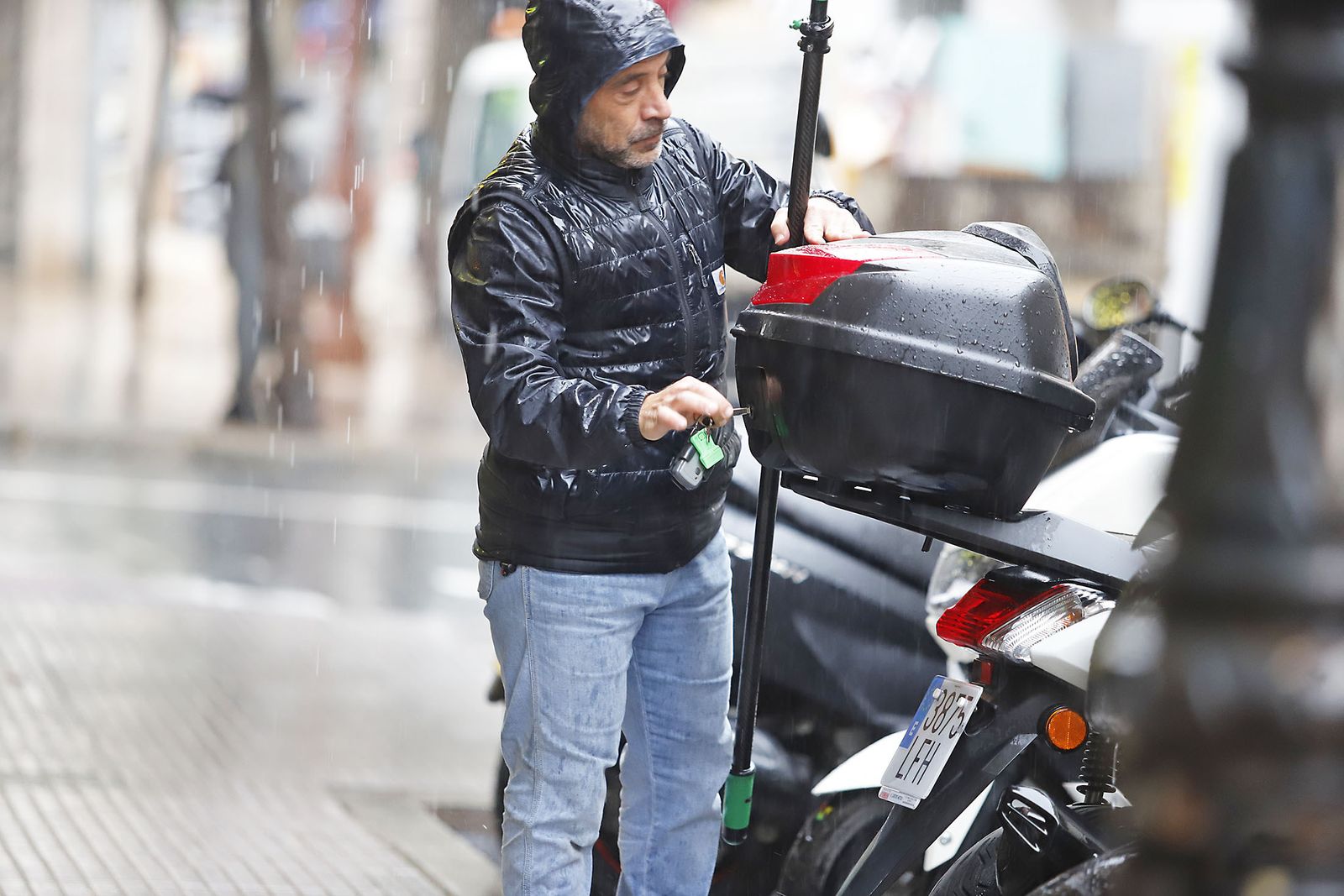 imágenes de la lluviosa mañana en Huelva