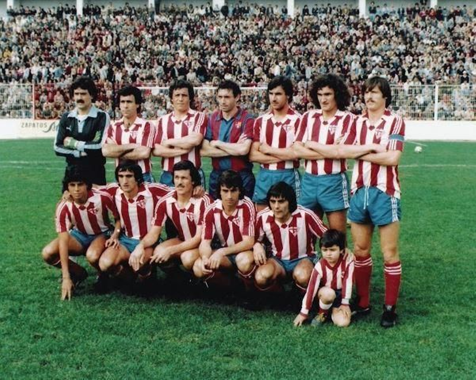 Quini, con el once del Almería.