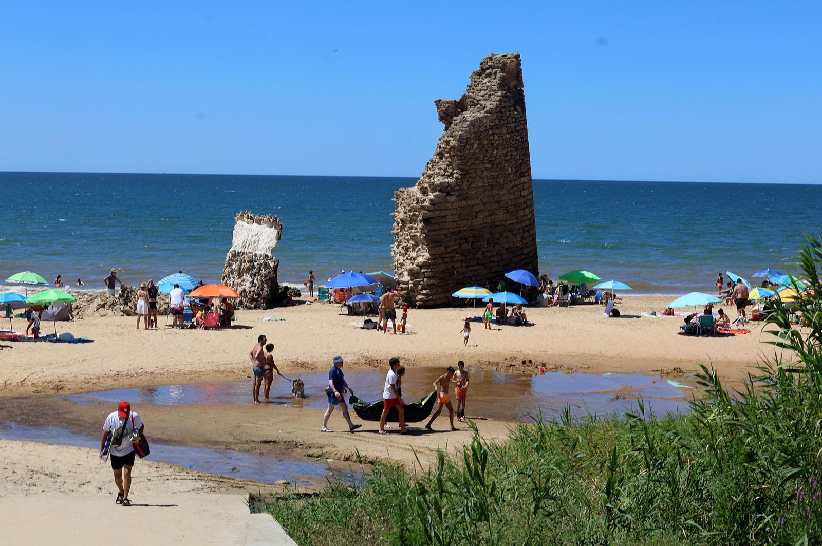 Imágenes de una maravillosa mañana de verano en las playas de la Torre del Loro y Mazagón