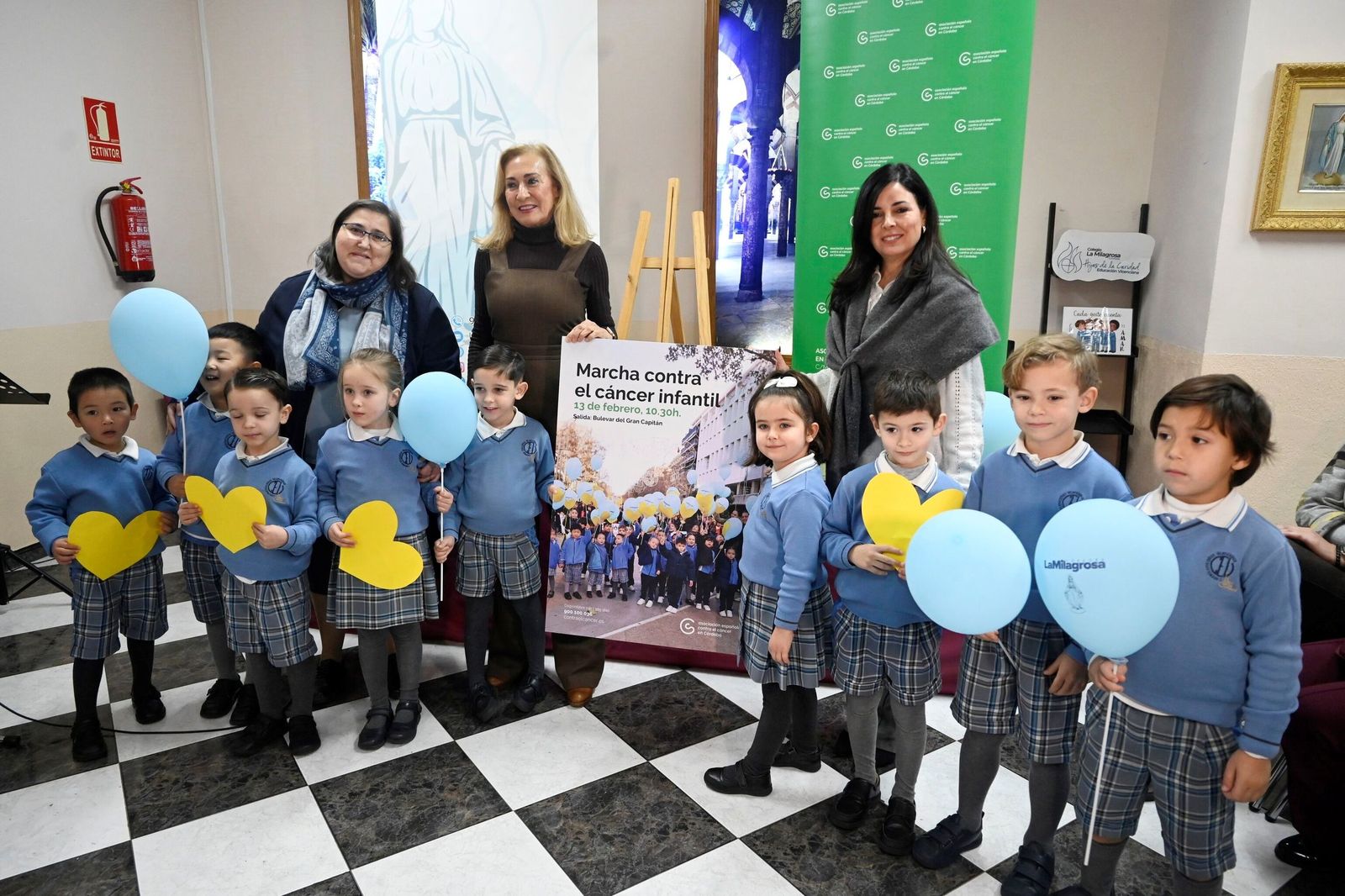 Presentación del cartel de la Marcha contra el cáncer infantil en el colegio La Milagrosa.