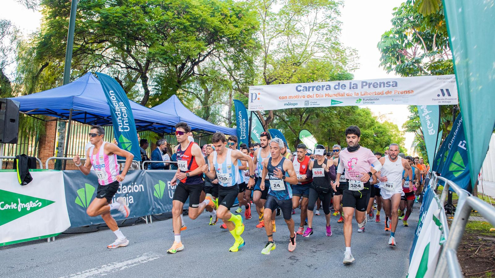 Búscate en las fotos de la Carrera de la Prensa en Málaga