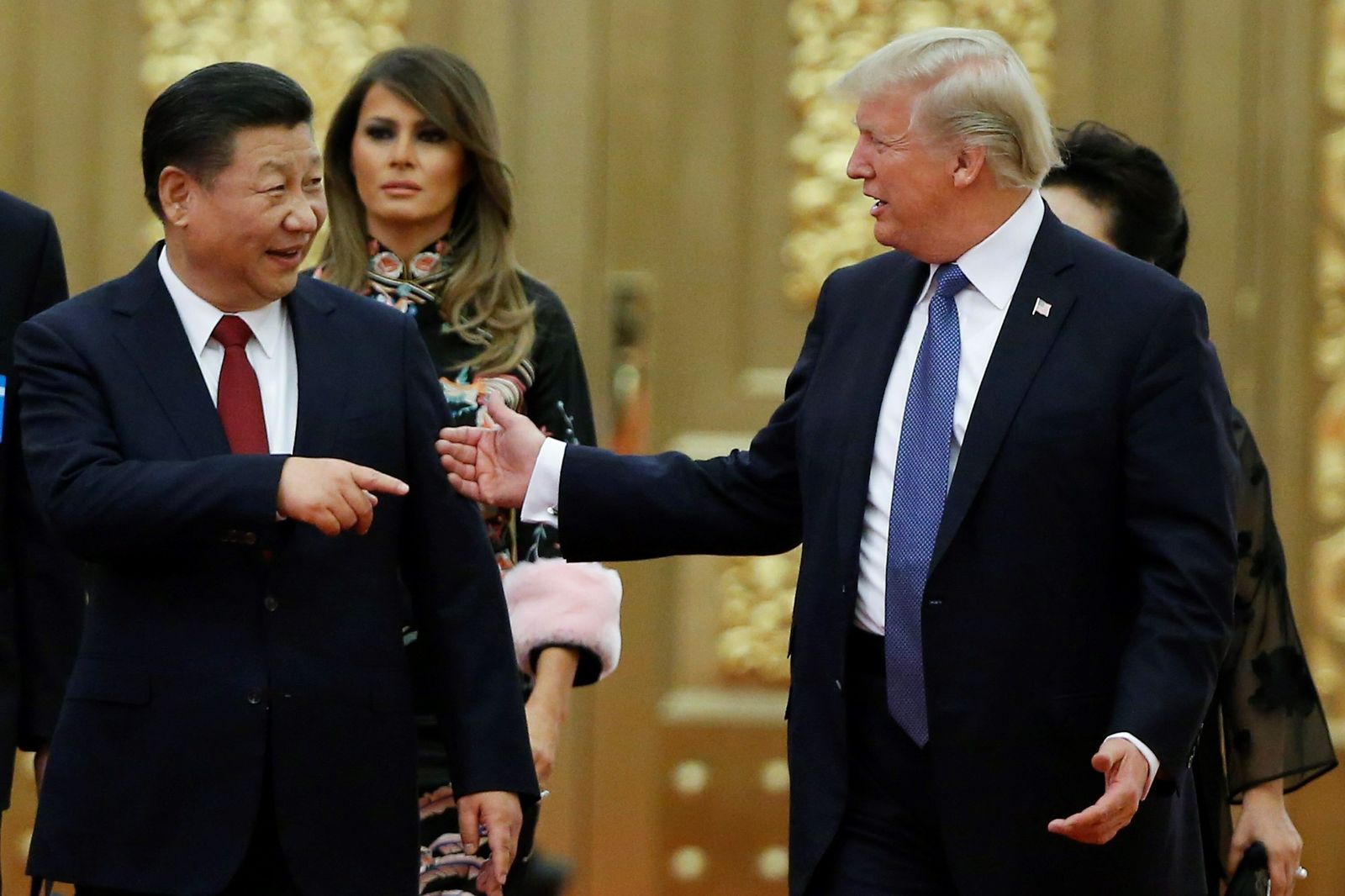 El presidente chino, Xi Jinping, y su homólogo estadounidense, Donald Trump, en una cena en noviembre de 2017 en Pekín.