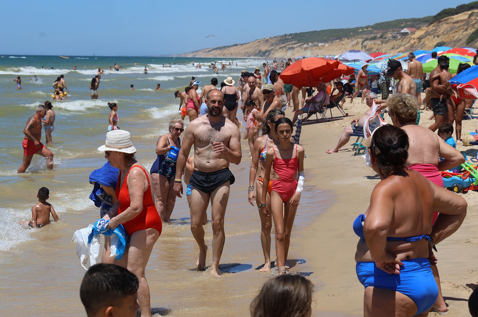 Imágenes de una mañana de calor y playa en Matalascañas