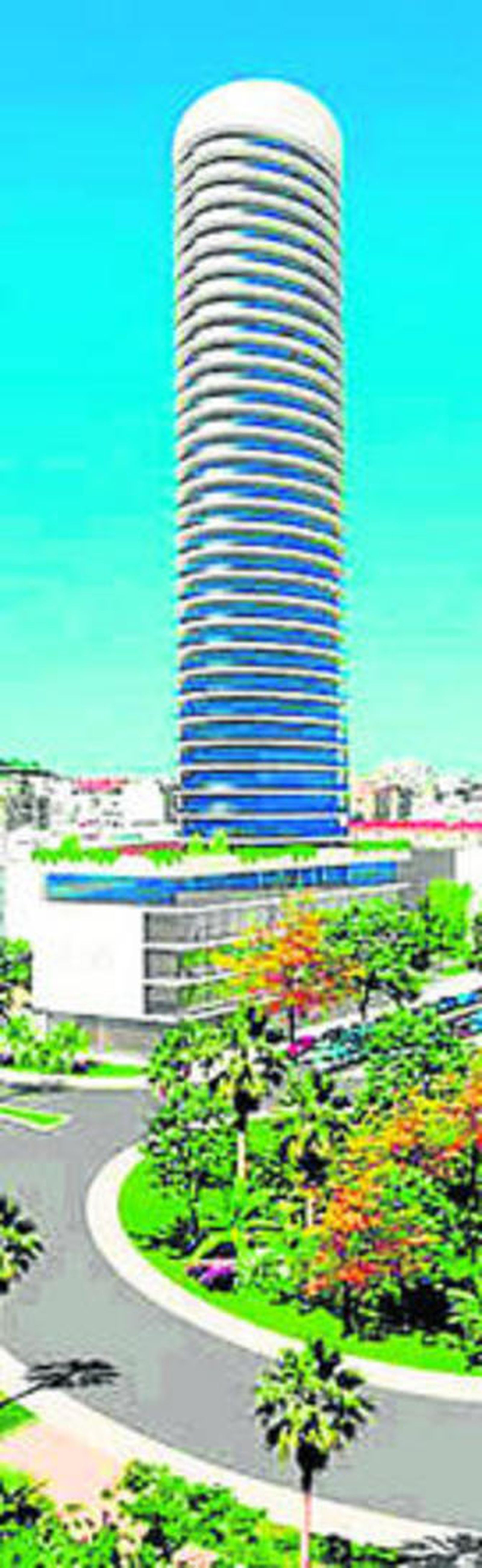 La alcaldesa, Teófila Martínez, muestra ayer el boceto del nuevo edificio que quiere construir Aguas de Cádiz junto a la Martona y que supondrá uno de los hitos de la Juan Carlos I.