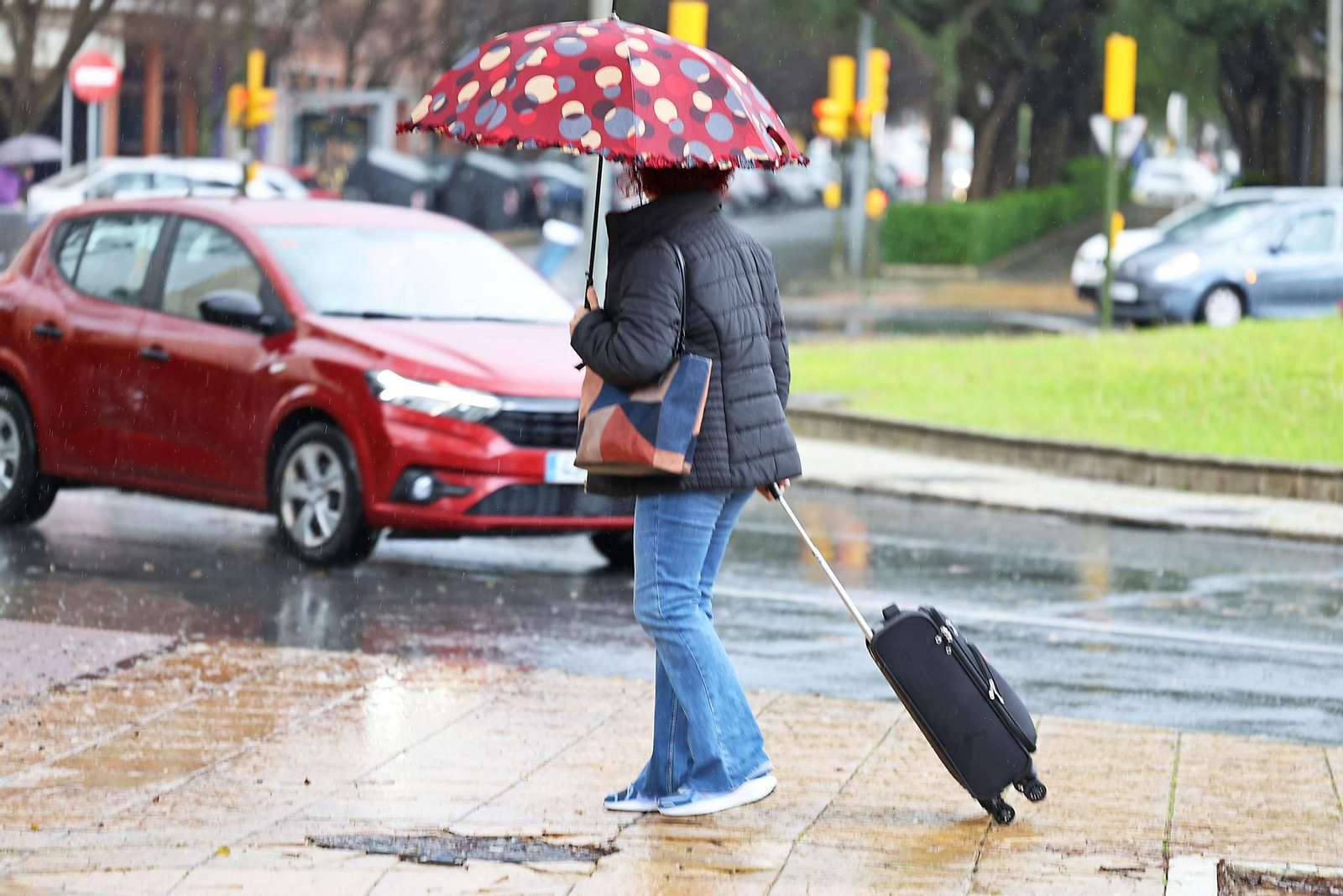 Las imágenes de la lluviosa mañana del jueves 13 de marzo en Huelva