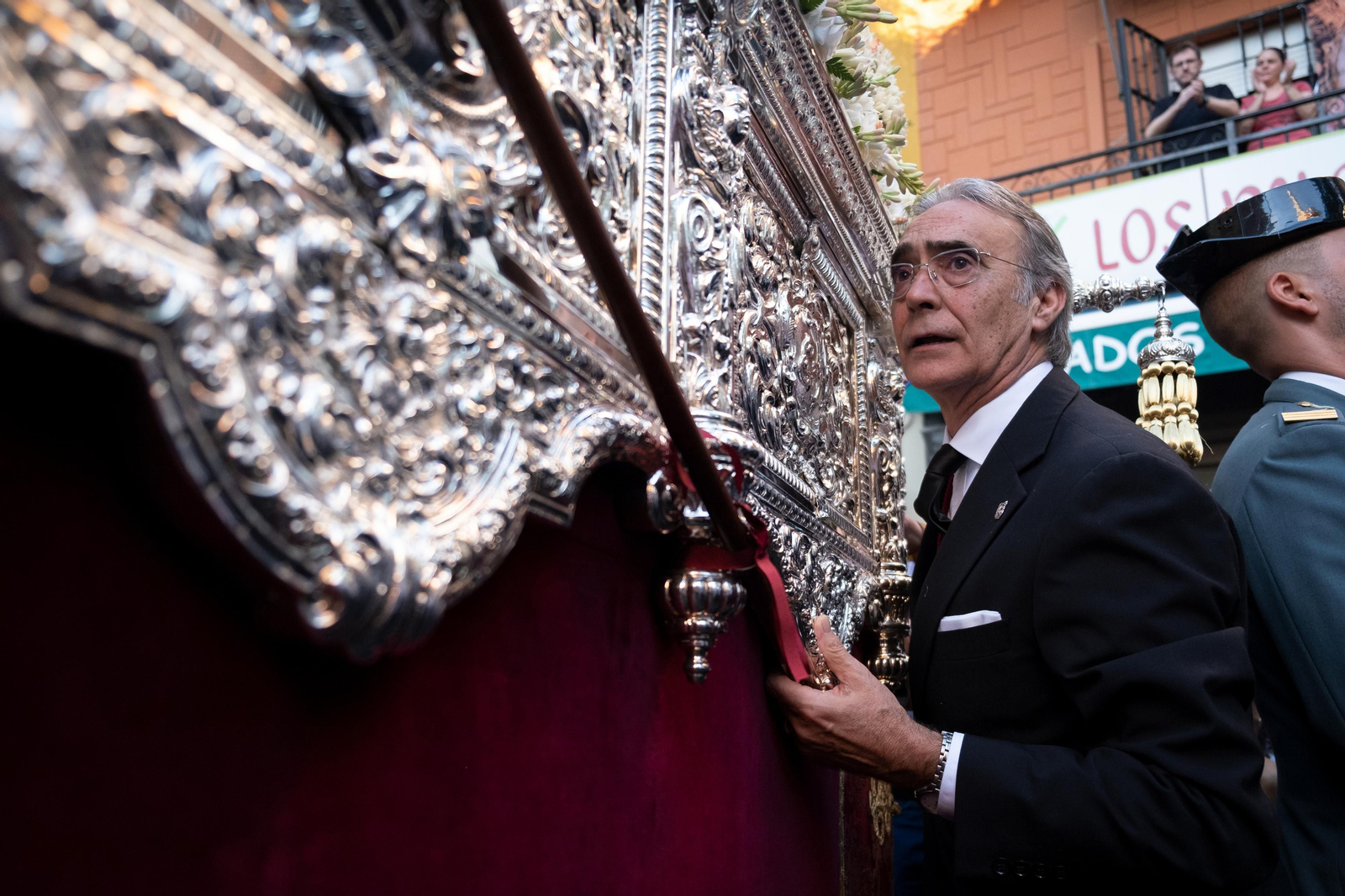 La procesión extraordinaria de la Virgen de los Dolores del Cerro del Águila, en imágenes
