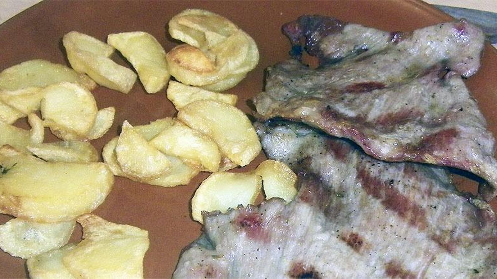 Cerdo ibérico a la parrilla del bar La Herradura de Ubrique.