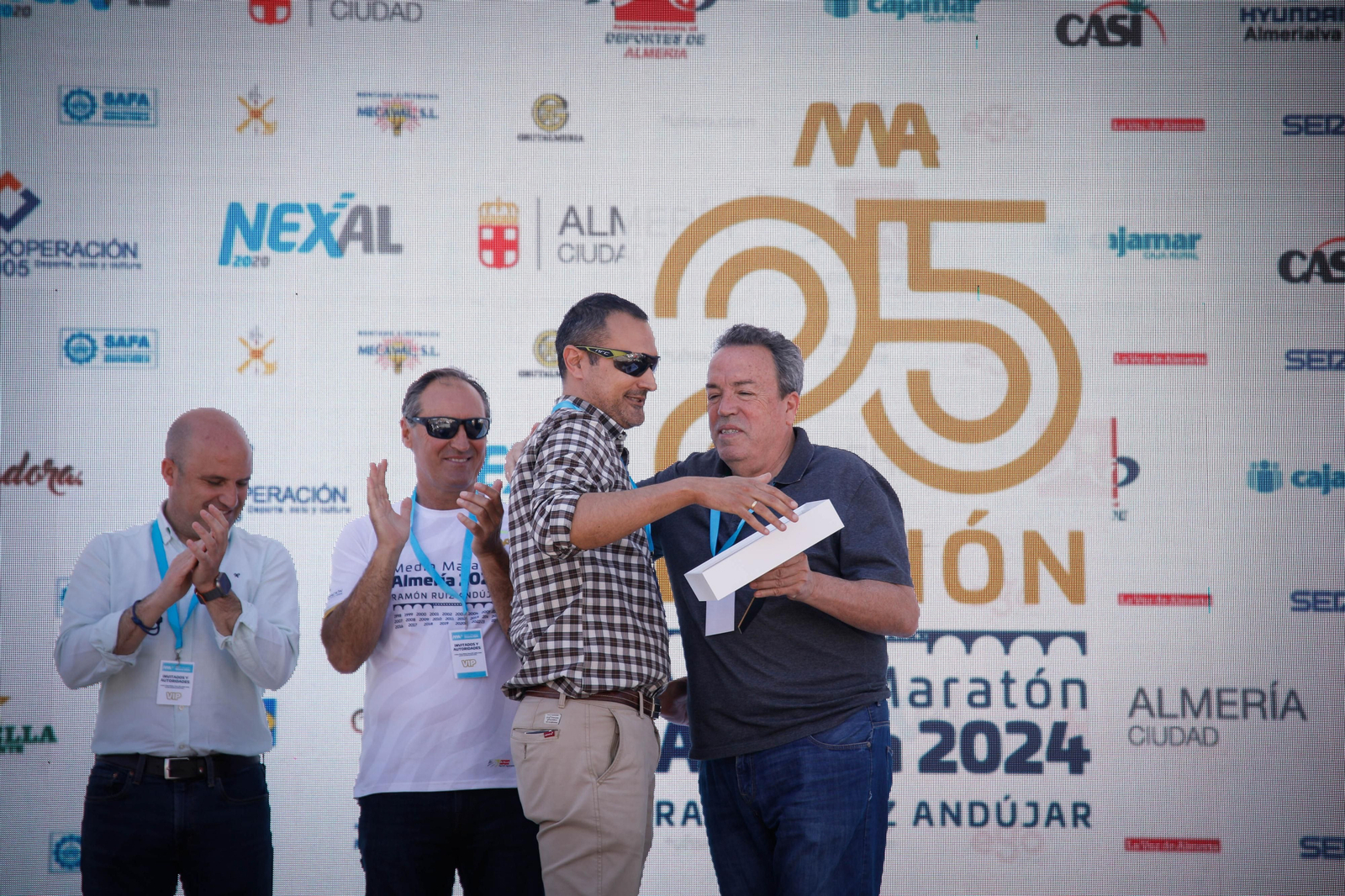 Imágenes de los premiados en la Media maratón de la Cuidad de Almería