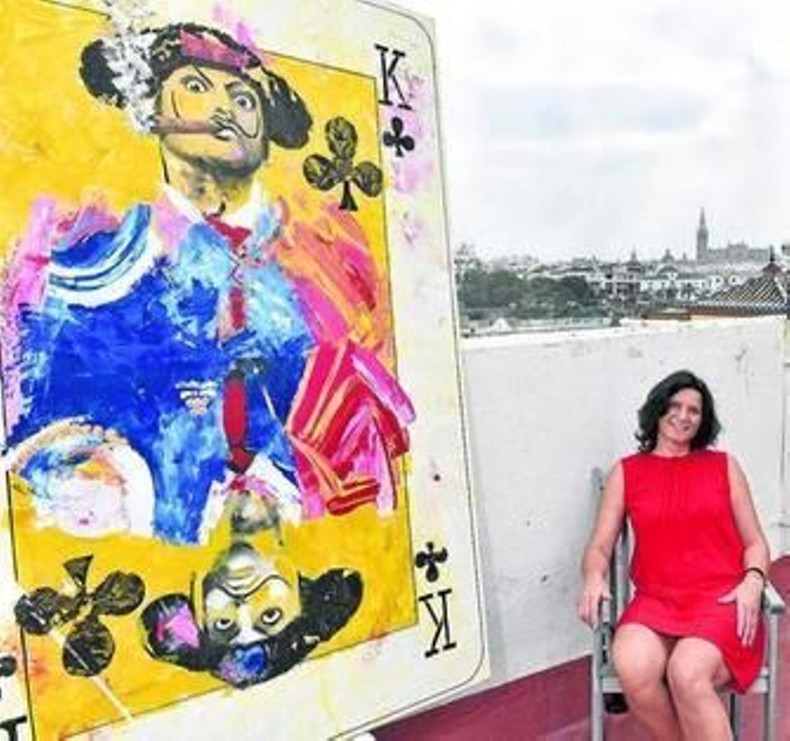 Alexandra del Bene, junto al cartel de Morante en San Jorge, frente a la Maestranza y la Catedral.