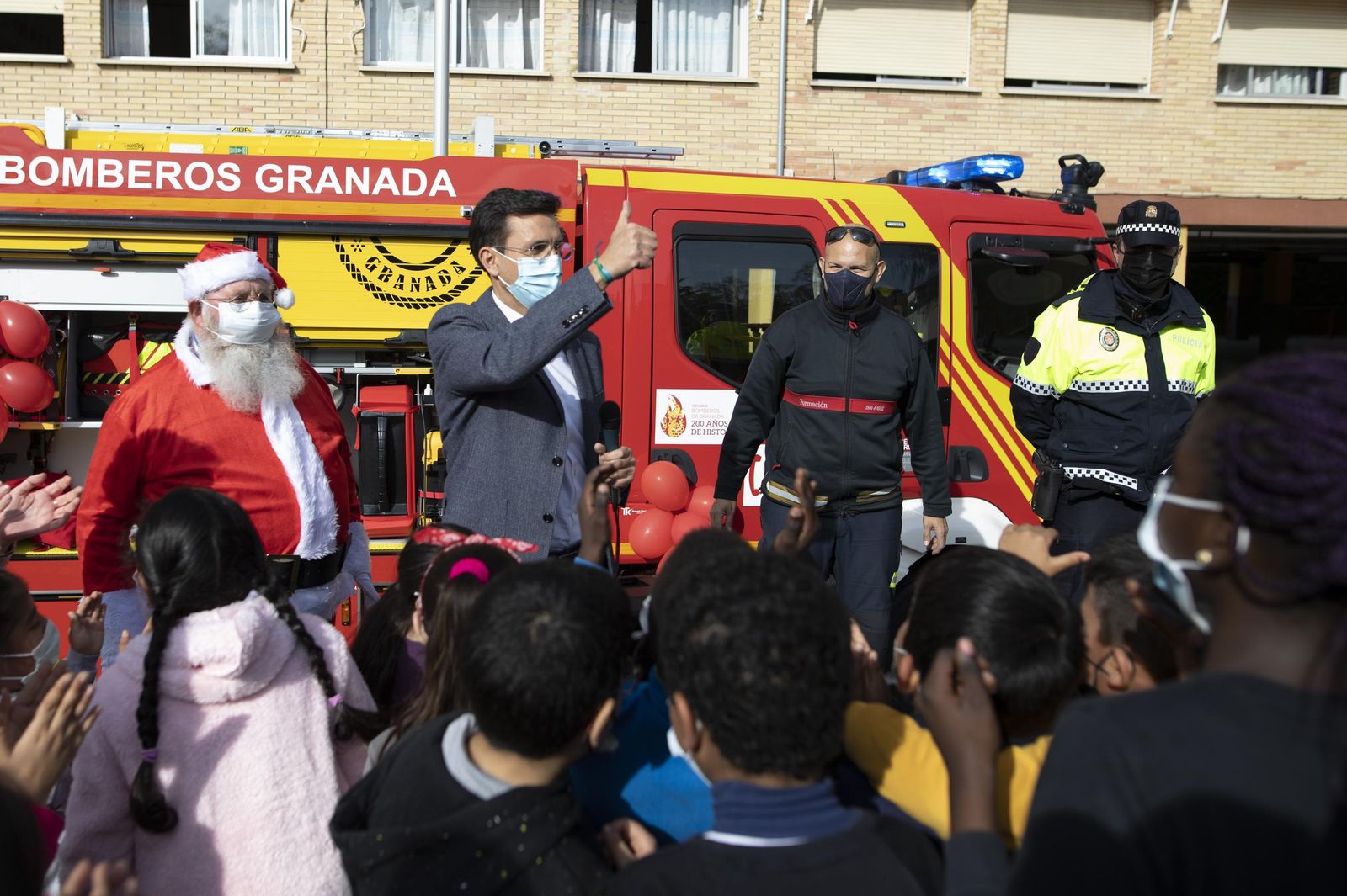 Fotos de las cabalgatas de Papá Noel en Granada