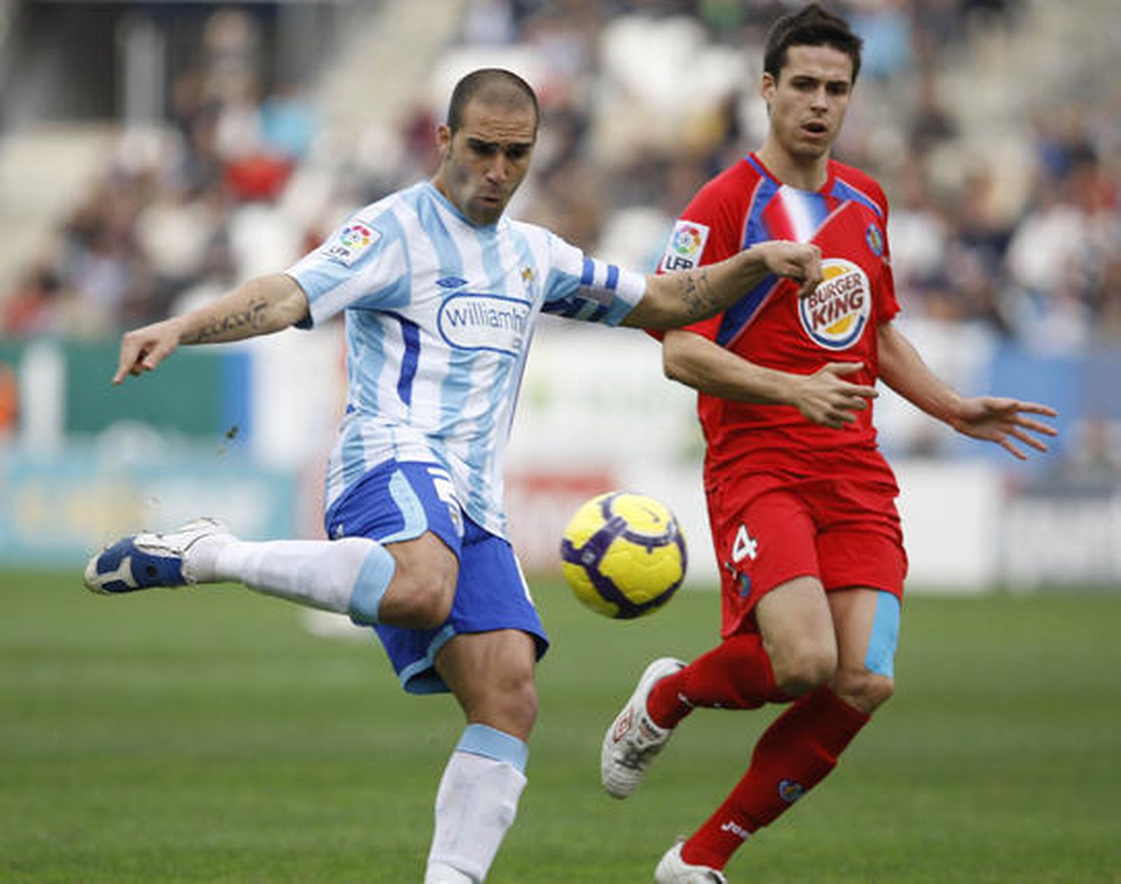 El Málaga respira tras su victoria en Liga ante el Getafe. / Sergio Camacho