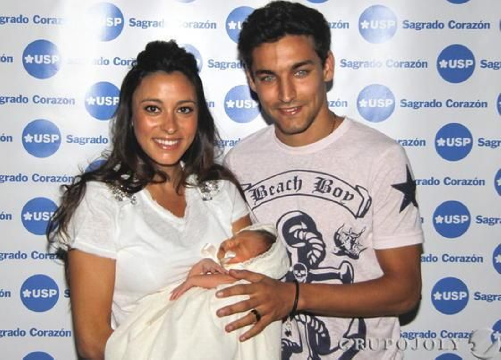 Junto a su hijo y su mujer en julio de 2012.

Foto: EFE