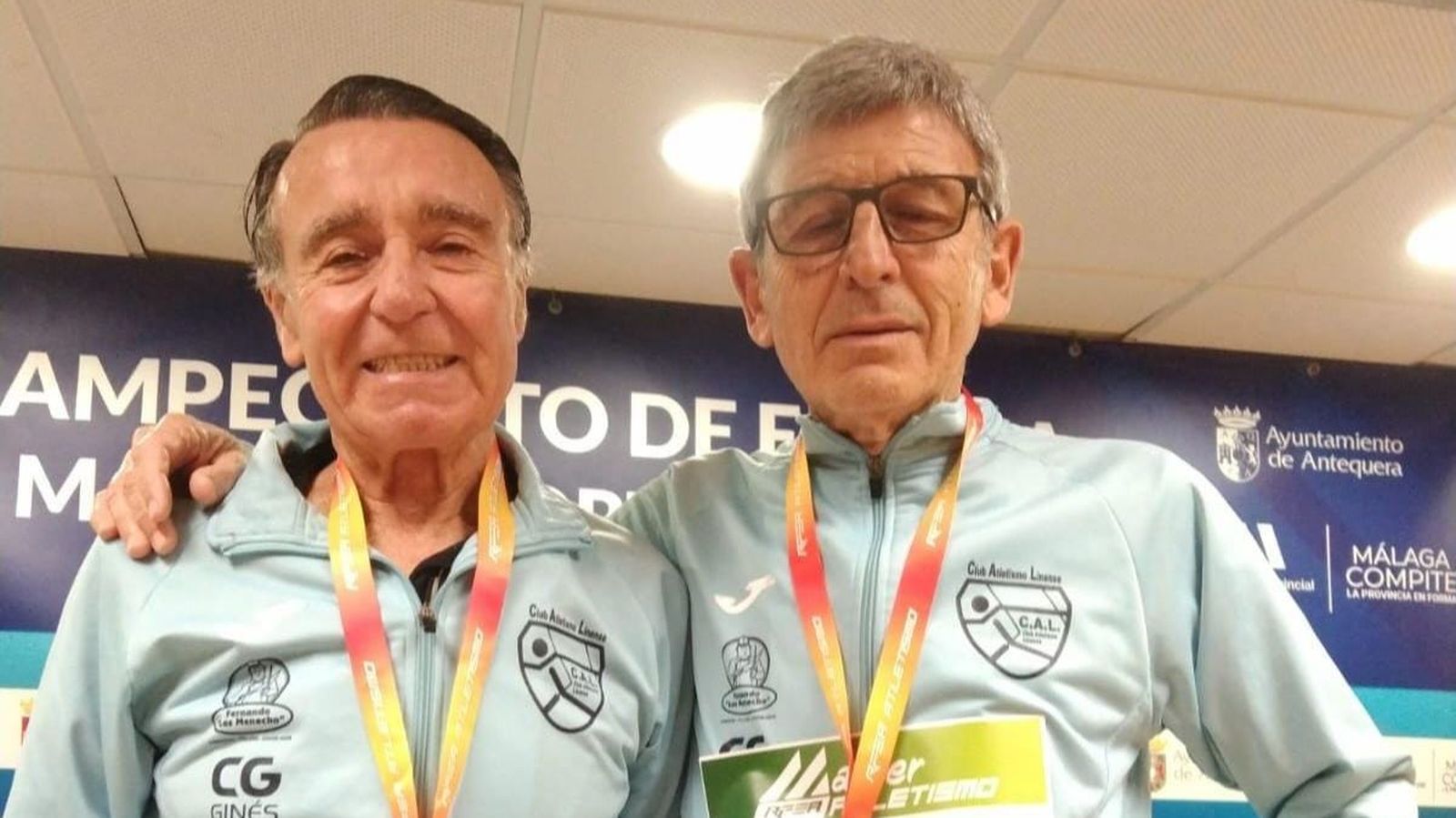 Salvador González  y Luis Miguel Almagro, del Club Atletismo Linense (CAL)