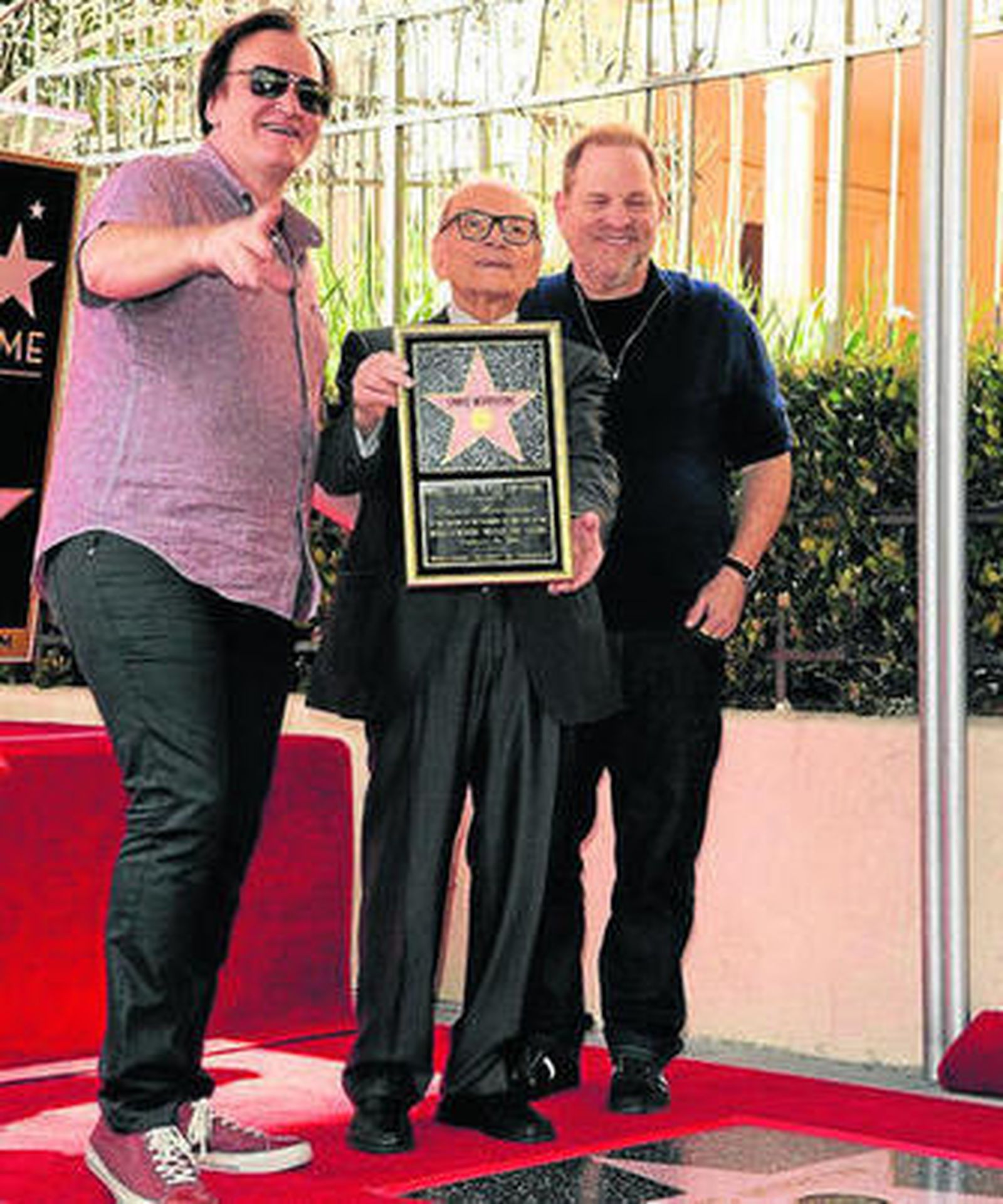 Ennio Morricono, en el centro, junto a Tarantino y Weinstein.