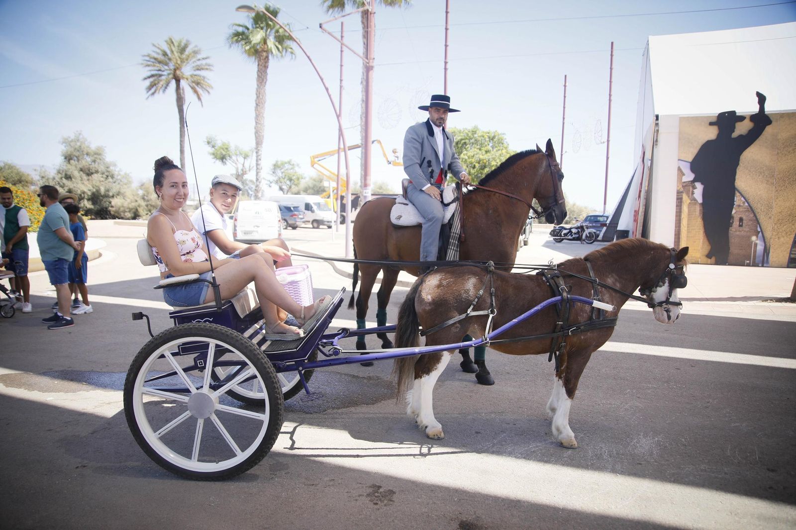 Las imágenes del paseo de Caballos y Carruajes, en el recinto ferial