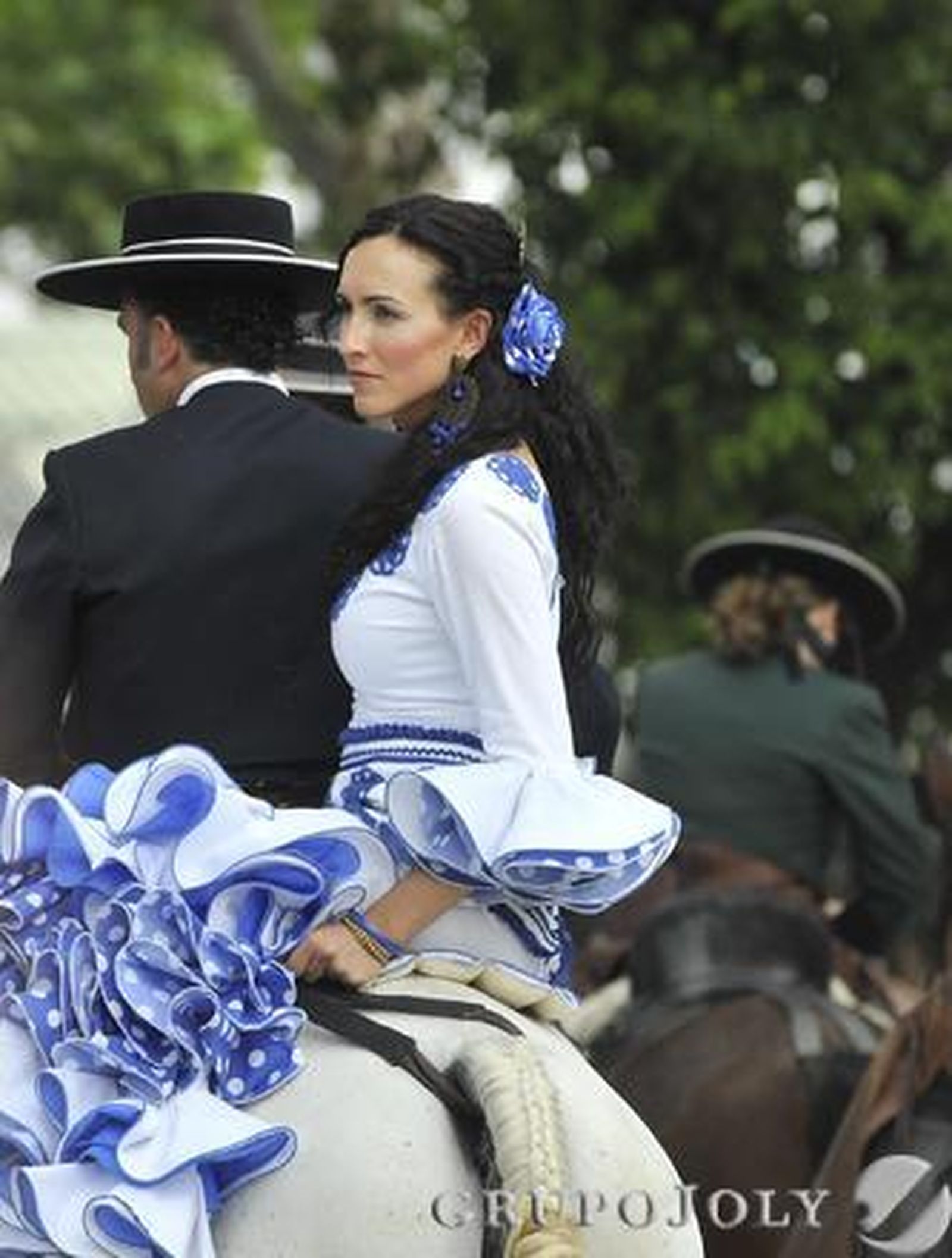 Caballistas y acompañantes en el Real.

Foto: Juan Carlos Vázquez