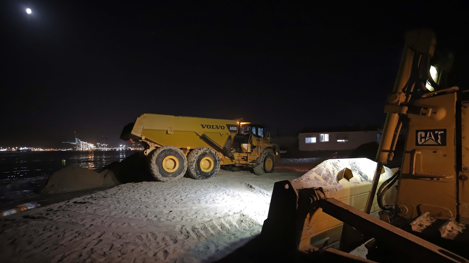 Fotos del trasvase de arena en El Rinconcillo