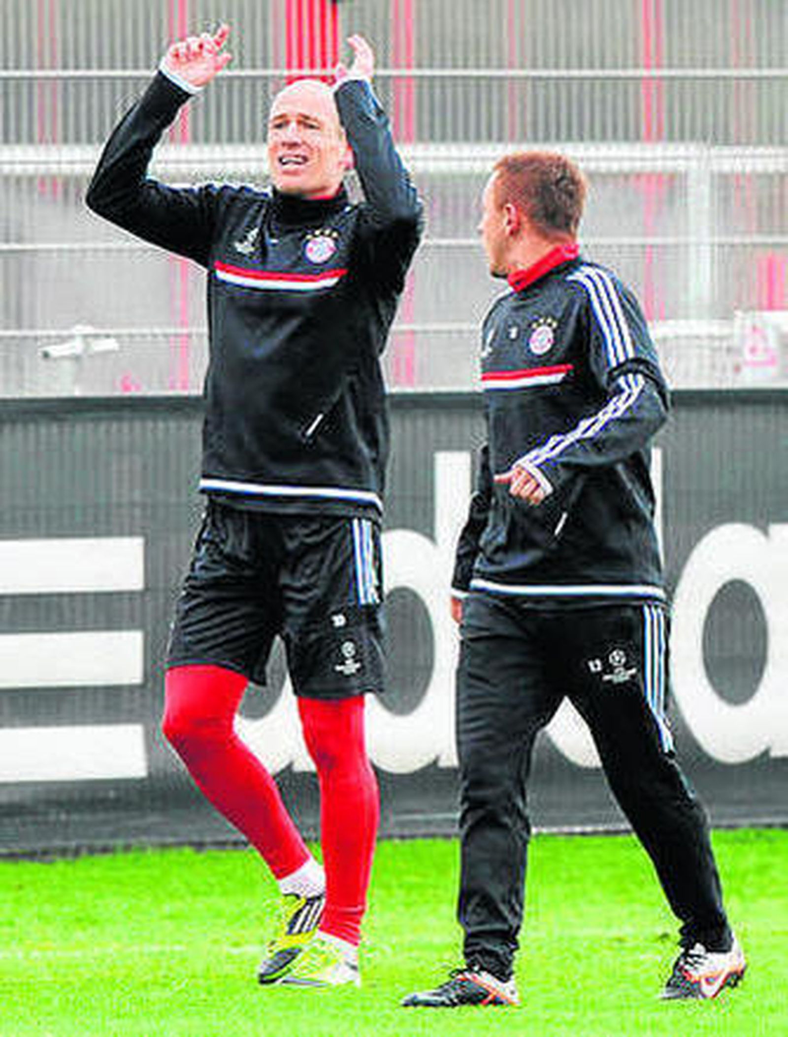 Robben, ayer con Rafinha.