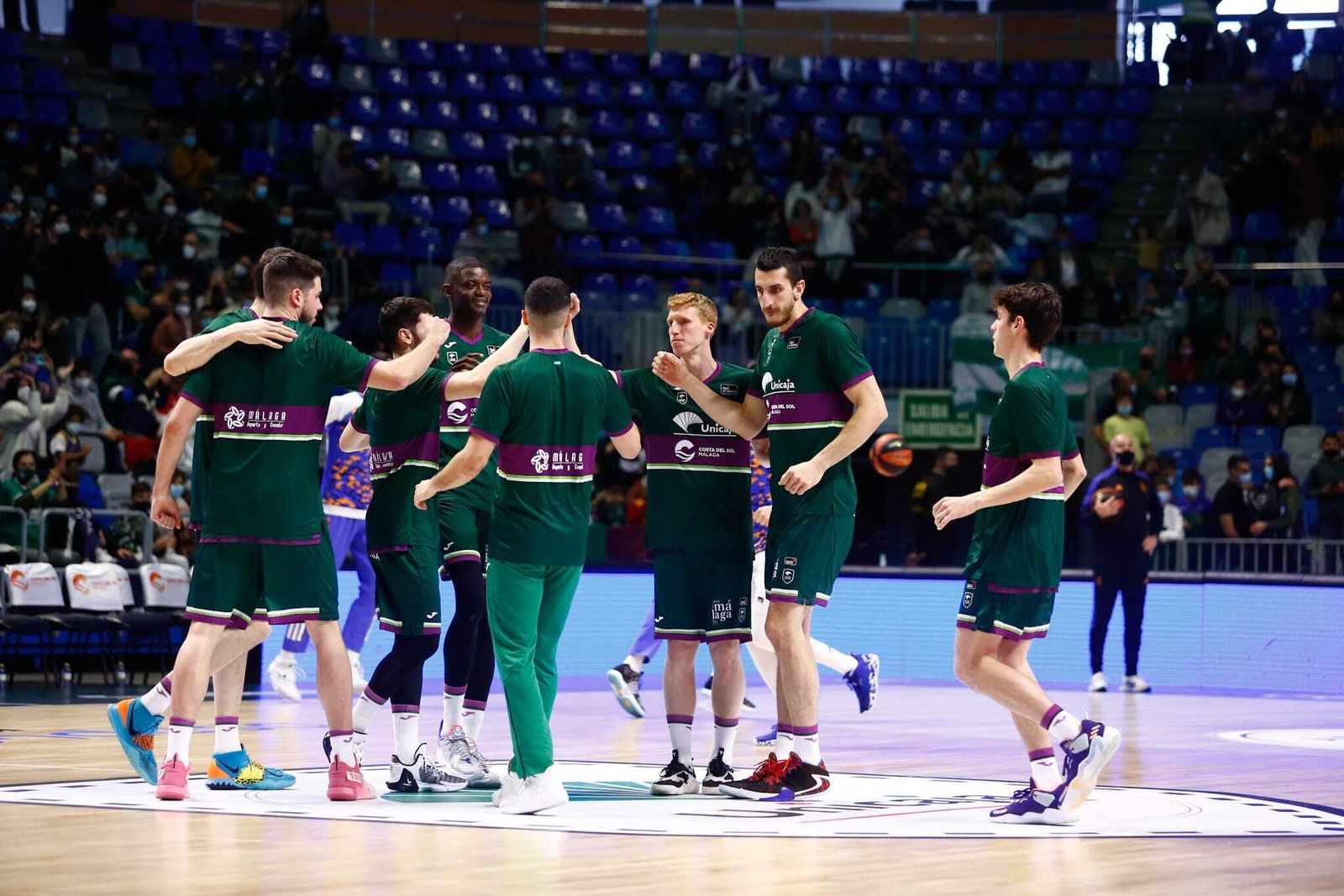 Calentamiento del Unicaja.