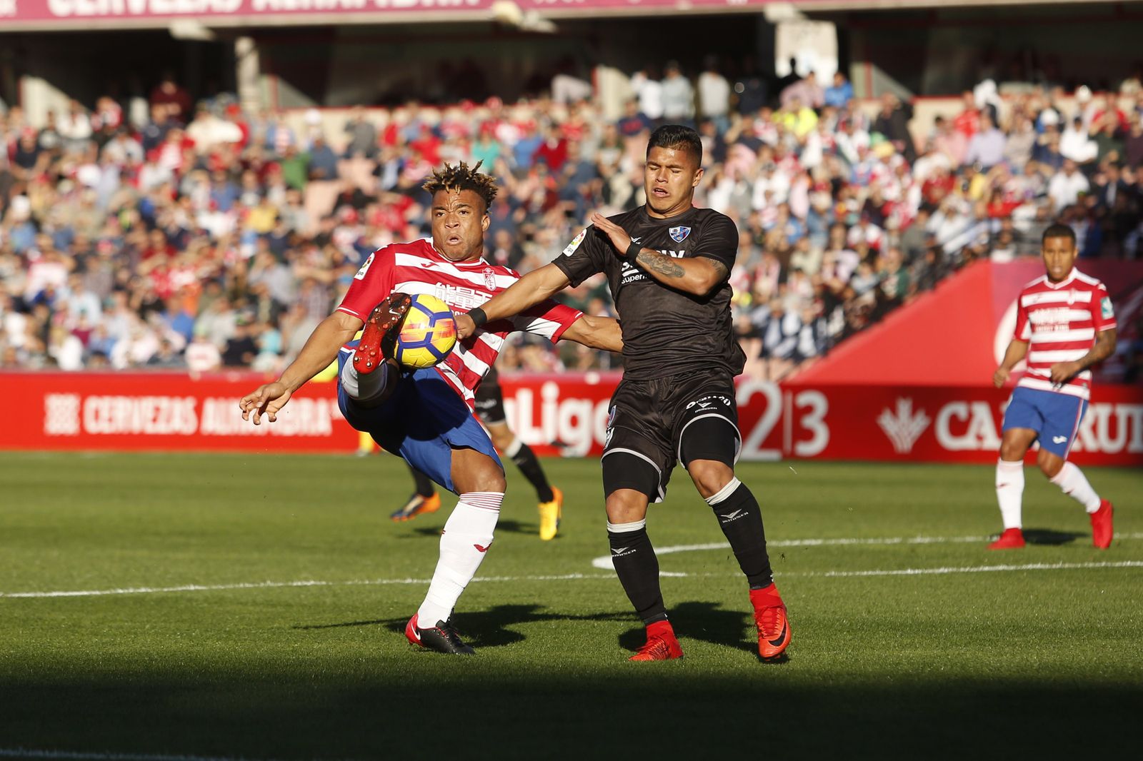 El Granada CF-Huesca, en imágenes