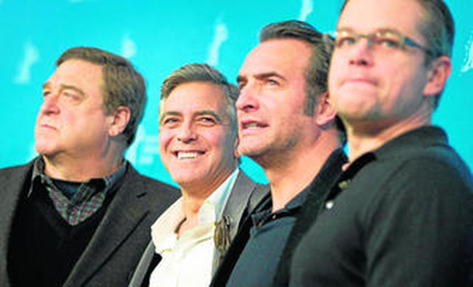 John Goodman, George Clooney, Jean Dujardin y Matt Damon, en la presentación del filme.