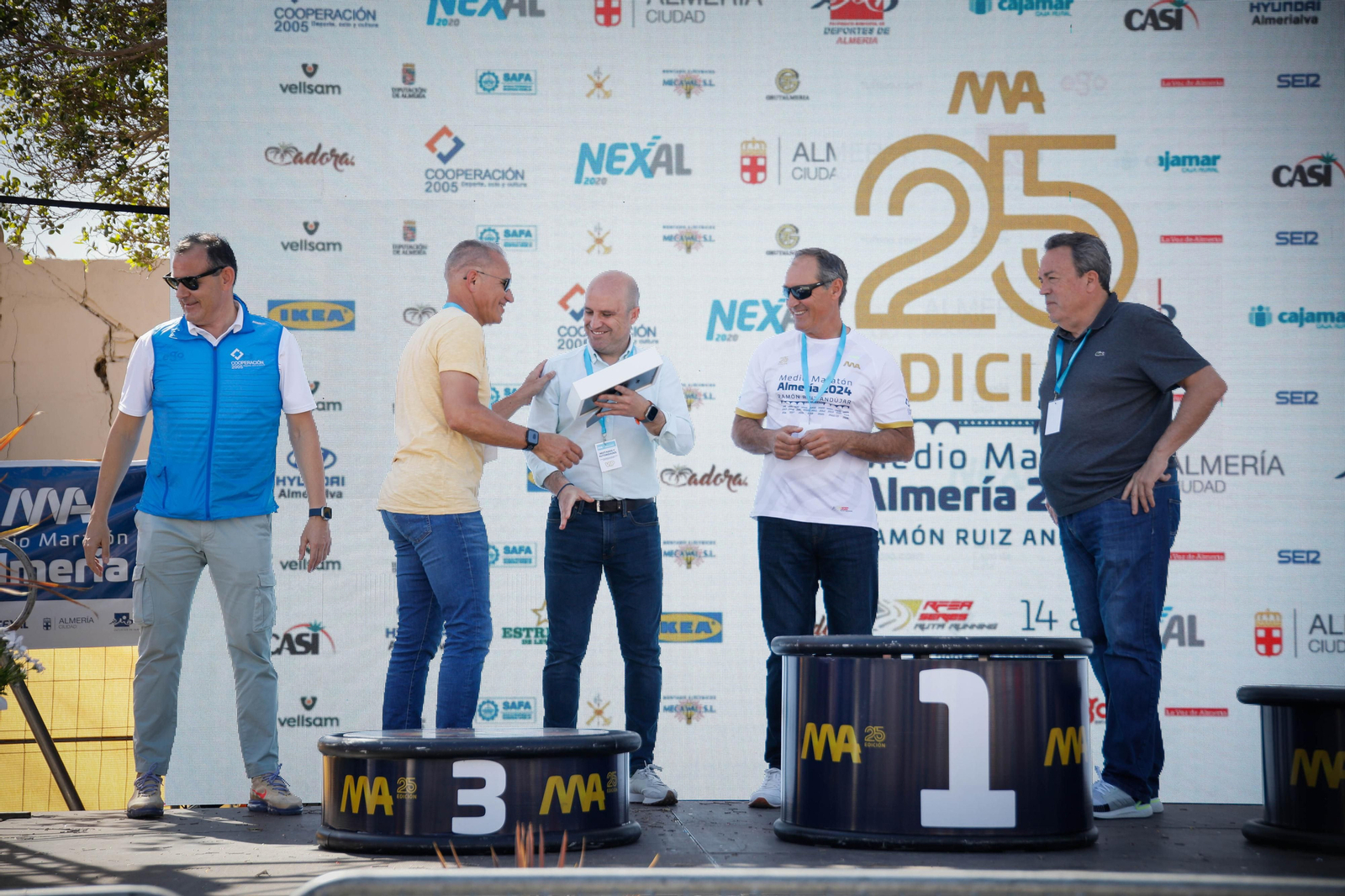 Imágenes de los premiados en la Media maratón de la Cuidad de Almería