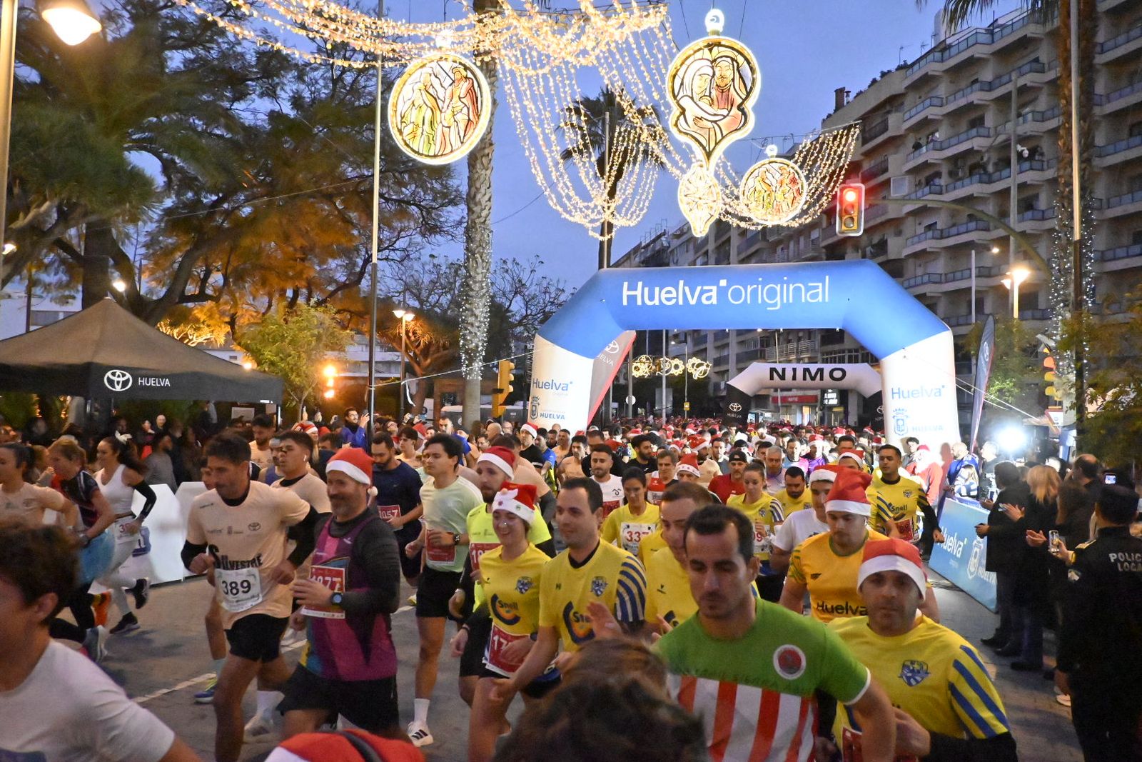 Búscate en las mejores fotografías de la San Silvestre de Huelva 2025