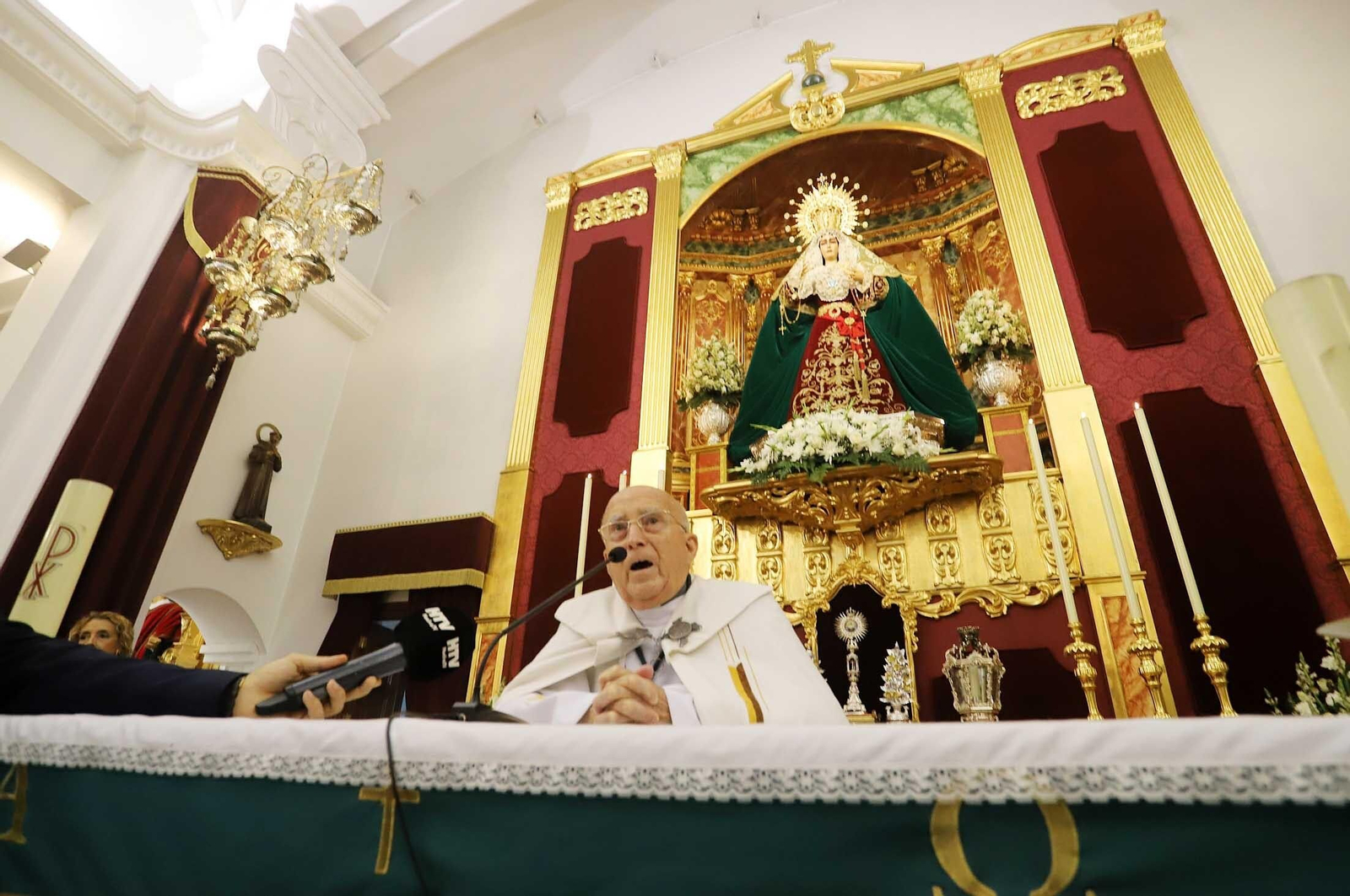 Imágenes de la procesión de la Virgen de la Amargura por las calles de Huelva