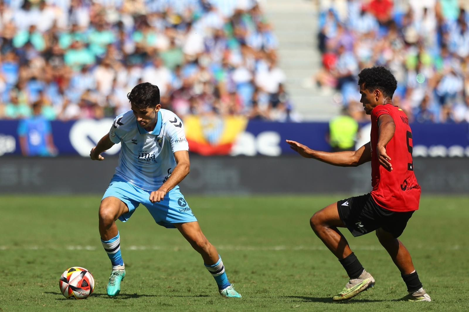 El Málaga CF-Melilla, en fotos