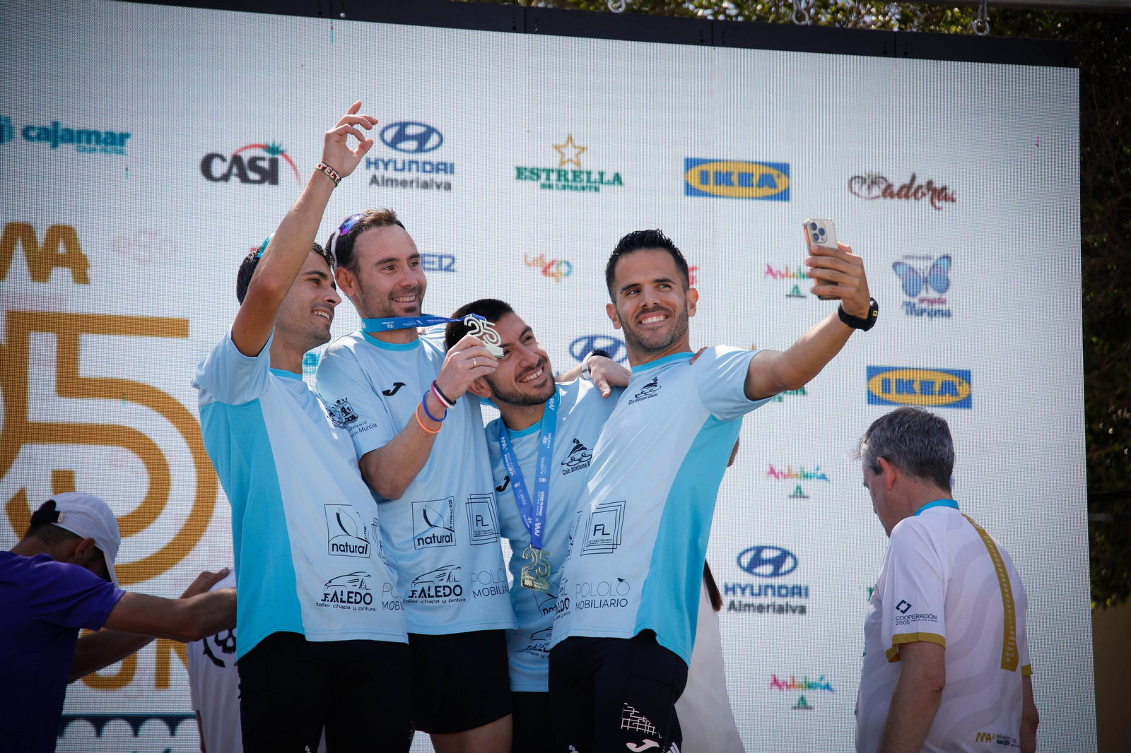 Imágenes de los premiados en la Media maratón de la Cuidad de Almería