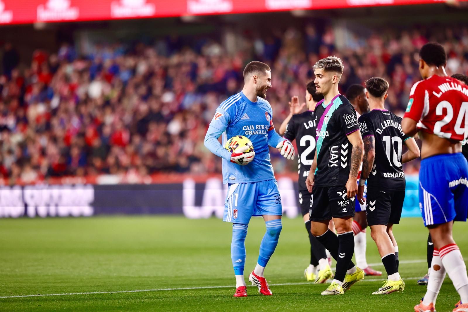 El Granada-Málaga CF, en fotos