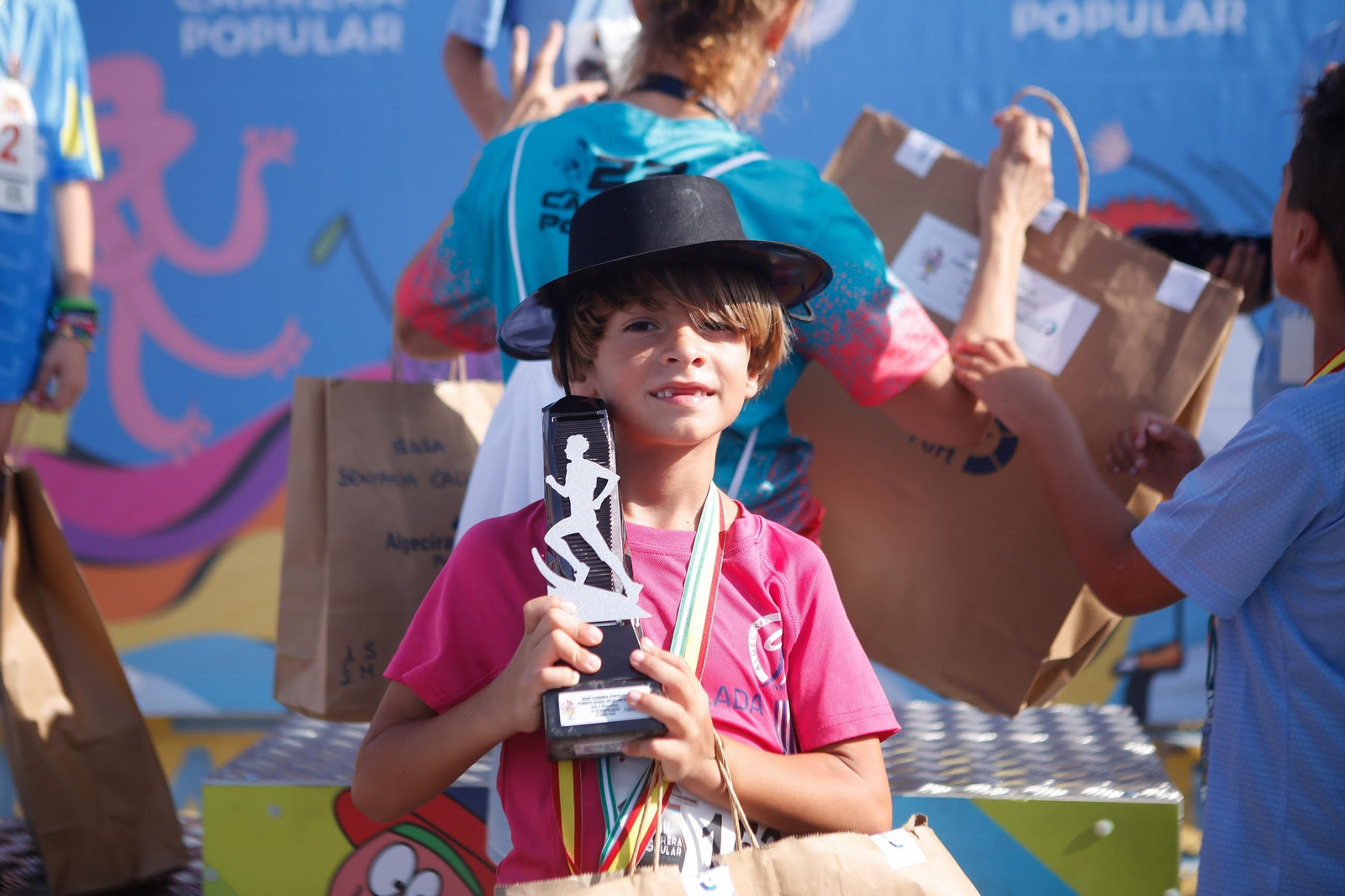 Búscate en la galería de fotos de categorías inferiores de la XXIII Carrera Popular Puerto Bahía de Algeciras
