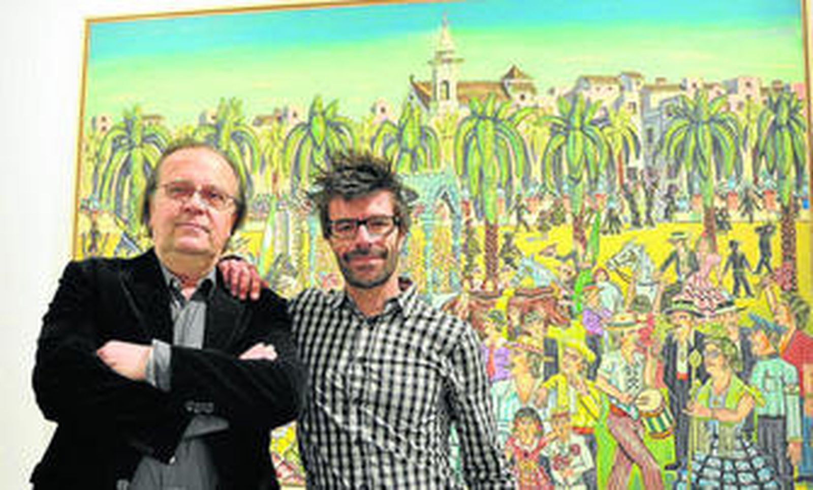 Florencio y Chencho Aguilera, junto a un cuadro de Rafael Aguilera cuando expusieron en el convento de Santa Inés de Sevilla.