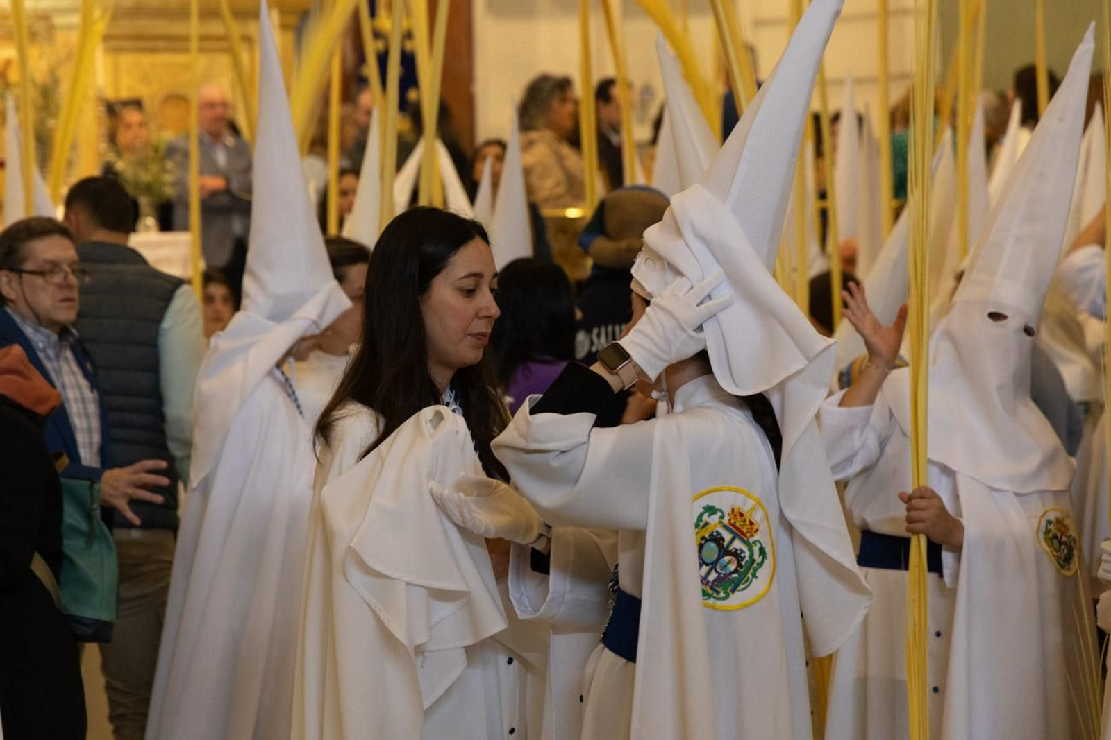 Los jiennenses se echan a la calle para presenciar la primera de las procesiones de la jornada: la Borriquilla (I)
