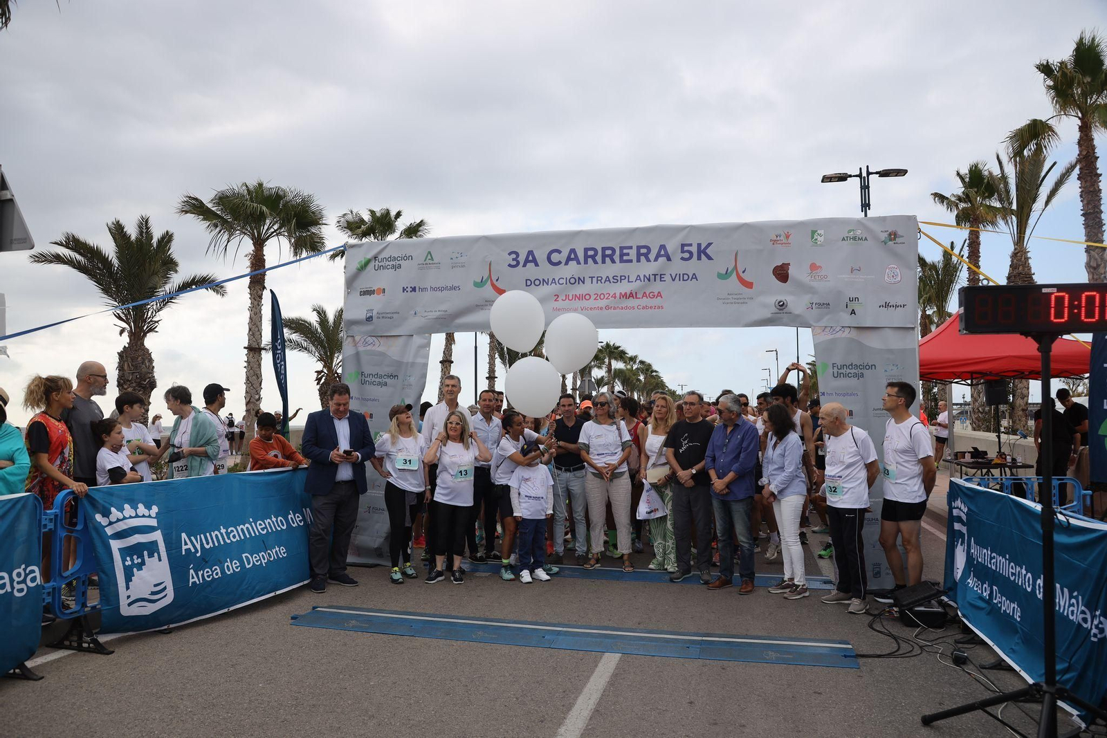 Las fotos de la 3ª carrera solidaria Memorial Vicente Granados en Málaga