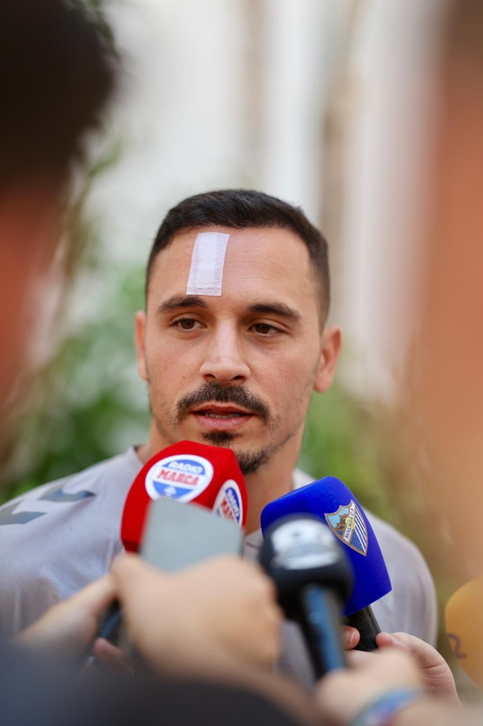 La ofrenda del Málaga CF a la Divina Pastora, en fotos
