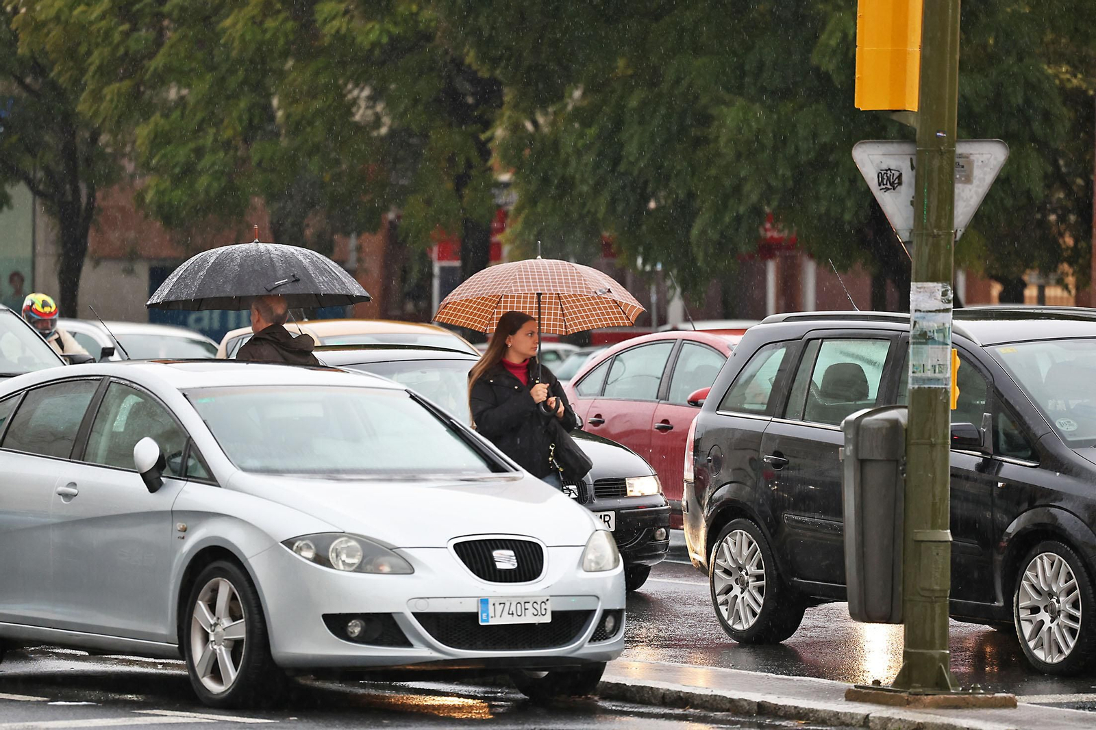 Las imágenes de la lluviosa mañana del jueves 13 de marzo en Huelva