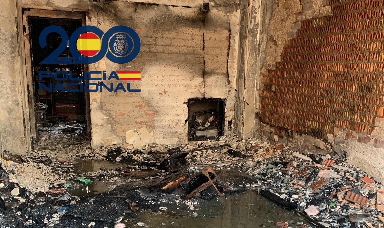Así quedó la casa de la víctima en Coria del Río.