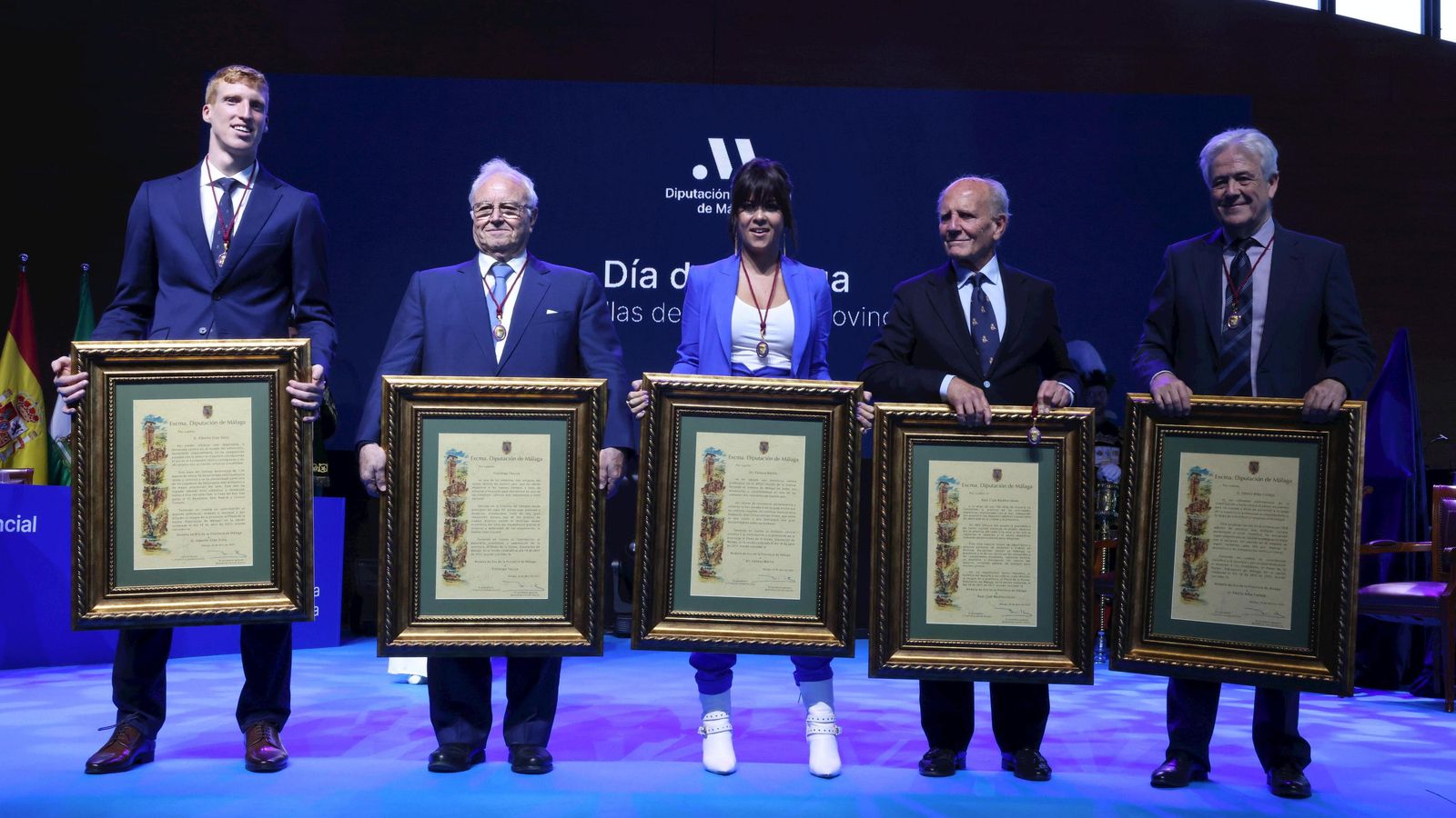 Los cinco premiados con sus Medallas de Oro.
