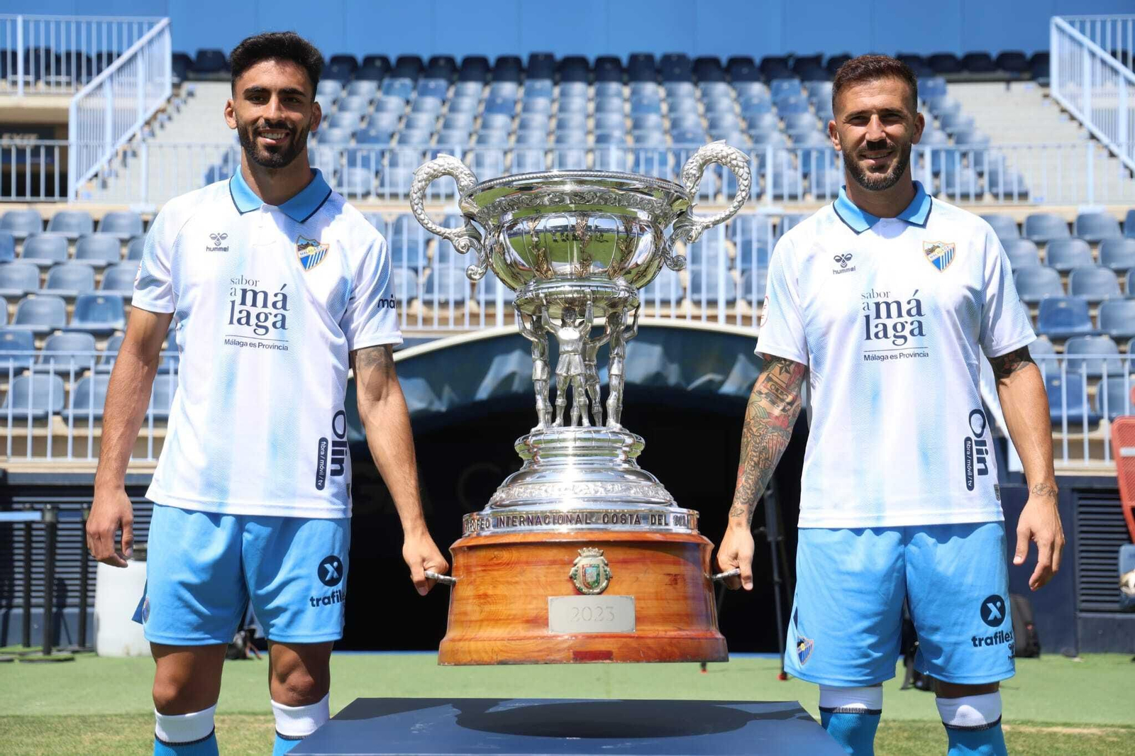 Juande y Dioni, con el trofeo Costa del Sol