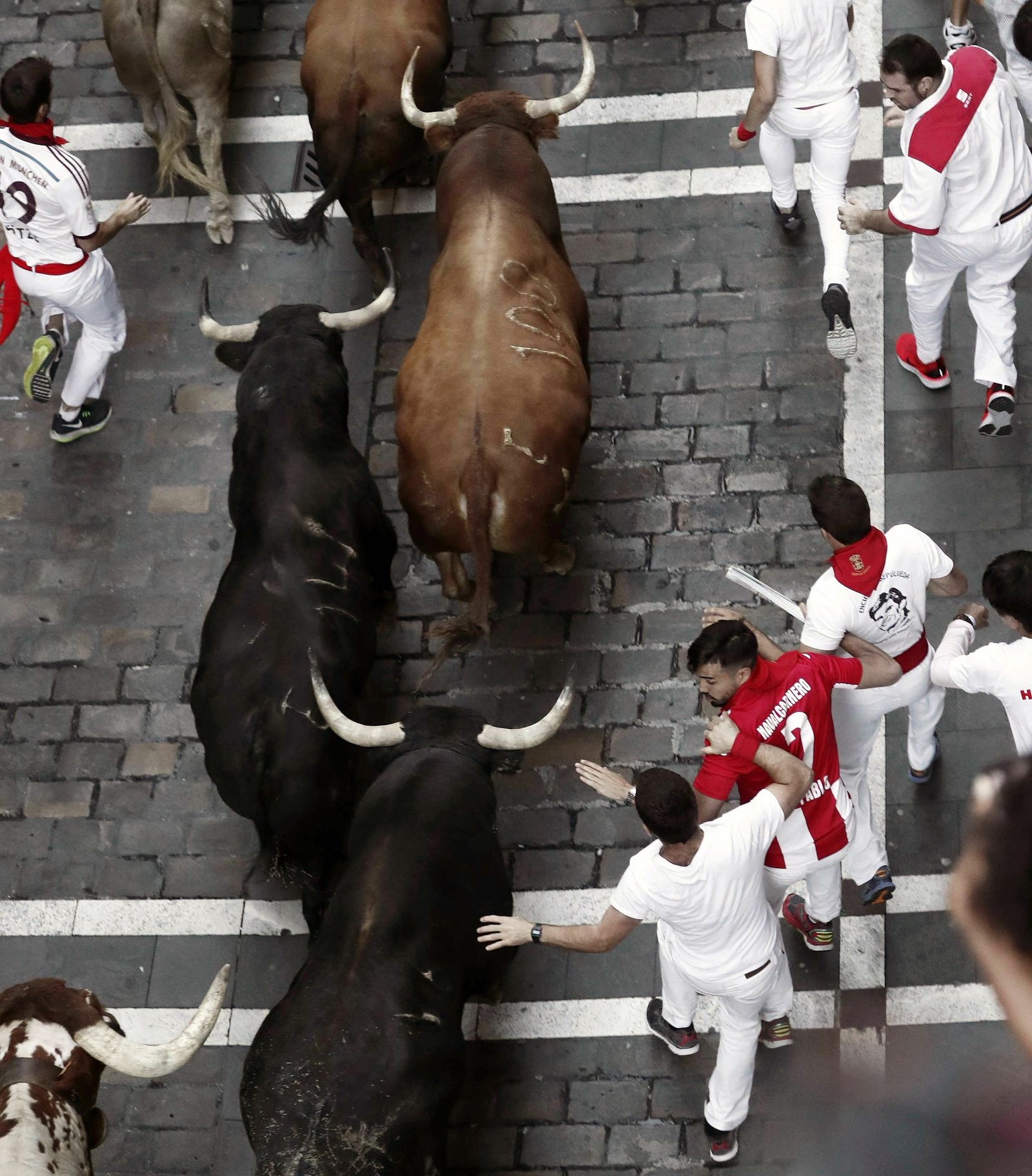 Las imágenes del sexto encierro de San Fermín 2019