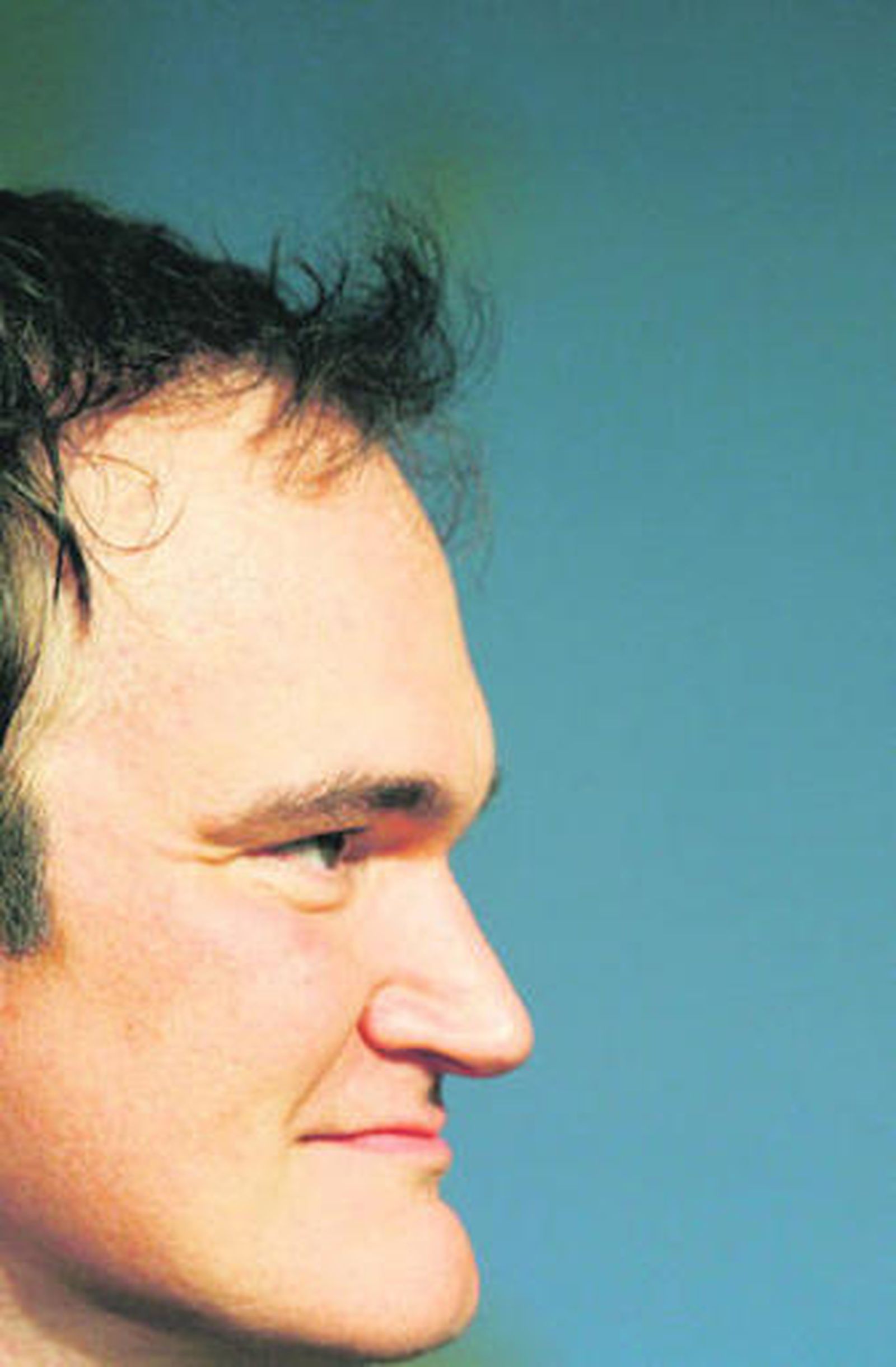 El reconocible y anguloso perfil de Quentin Tarantino.