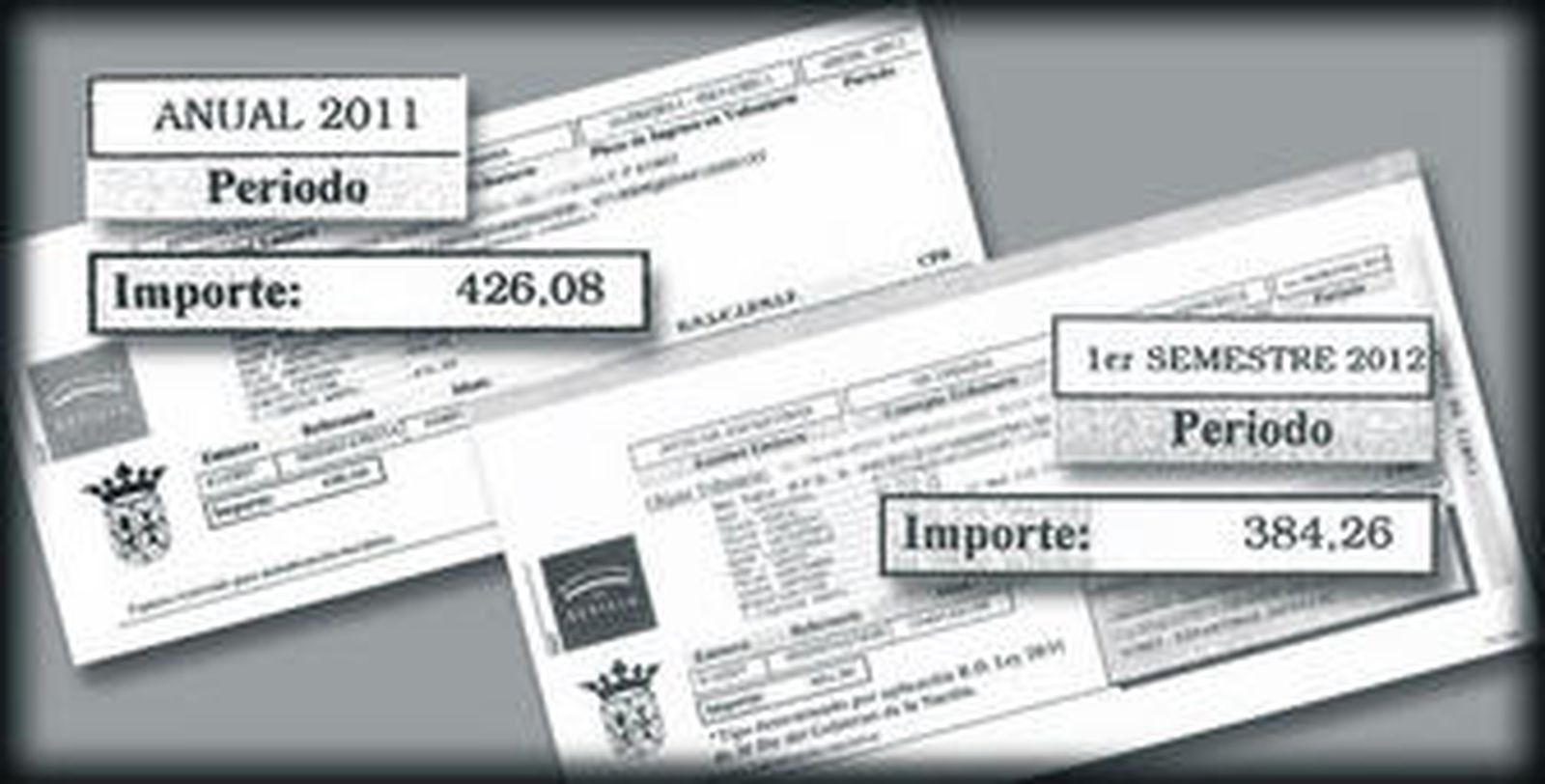 Dos recibos de una misma vivienda que ilustran la subida de la contribución en Espartinas.